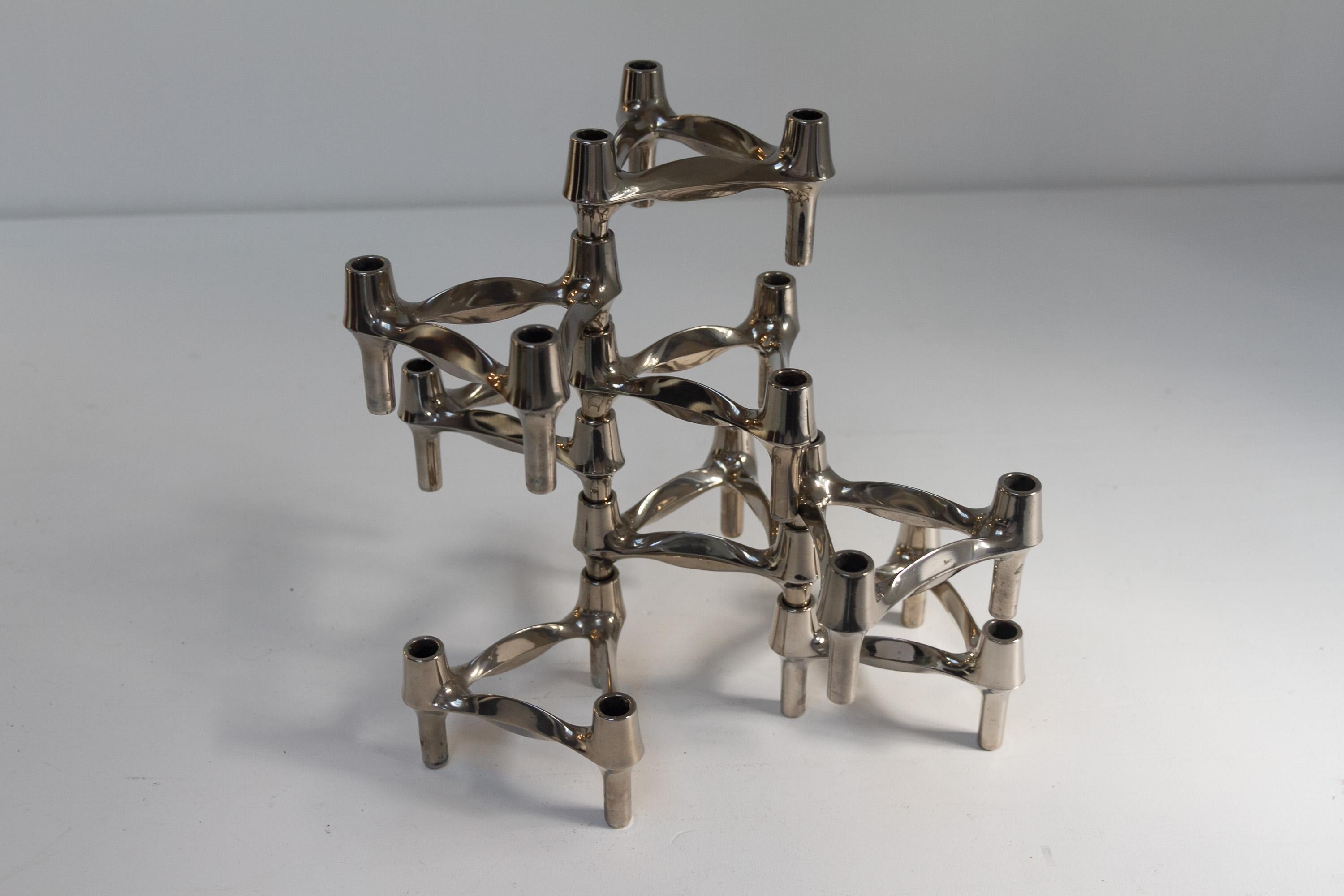 Portacandele modulari d'epoca di Stoffi & Stoffi per BMF Nagel, anni '60. Set di 8 pezzi.

Set di otto candele vintage originali in metallo disegnate da Fritz Nagel e Ceasar Stoffi per BMF Nagel, Germania, negli anni '60.
Ogni portacandela ha tre