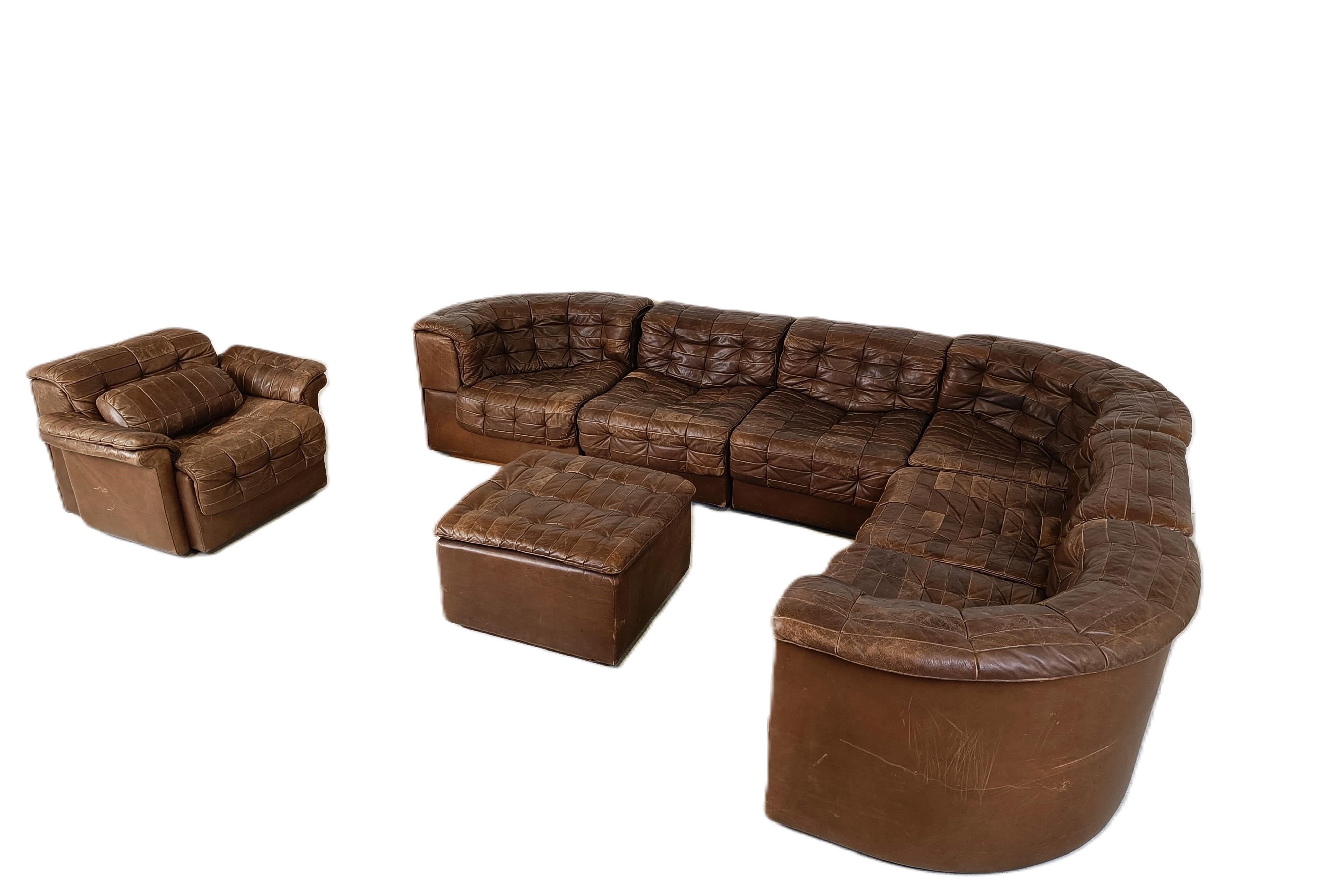 Mid century brown patchwork leather modular sofa by Desede.

Desede produced high quality leather sofas and is still producing today.

This DS11 model is quite rare to find.

This particular setup is great to fill up a living room thanks to the L