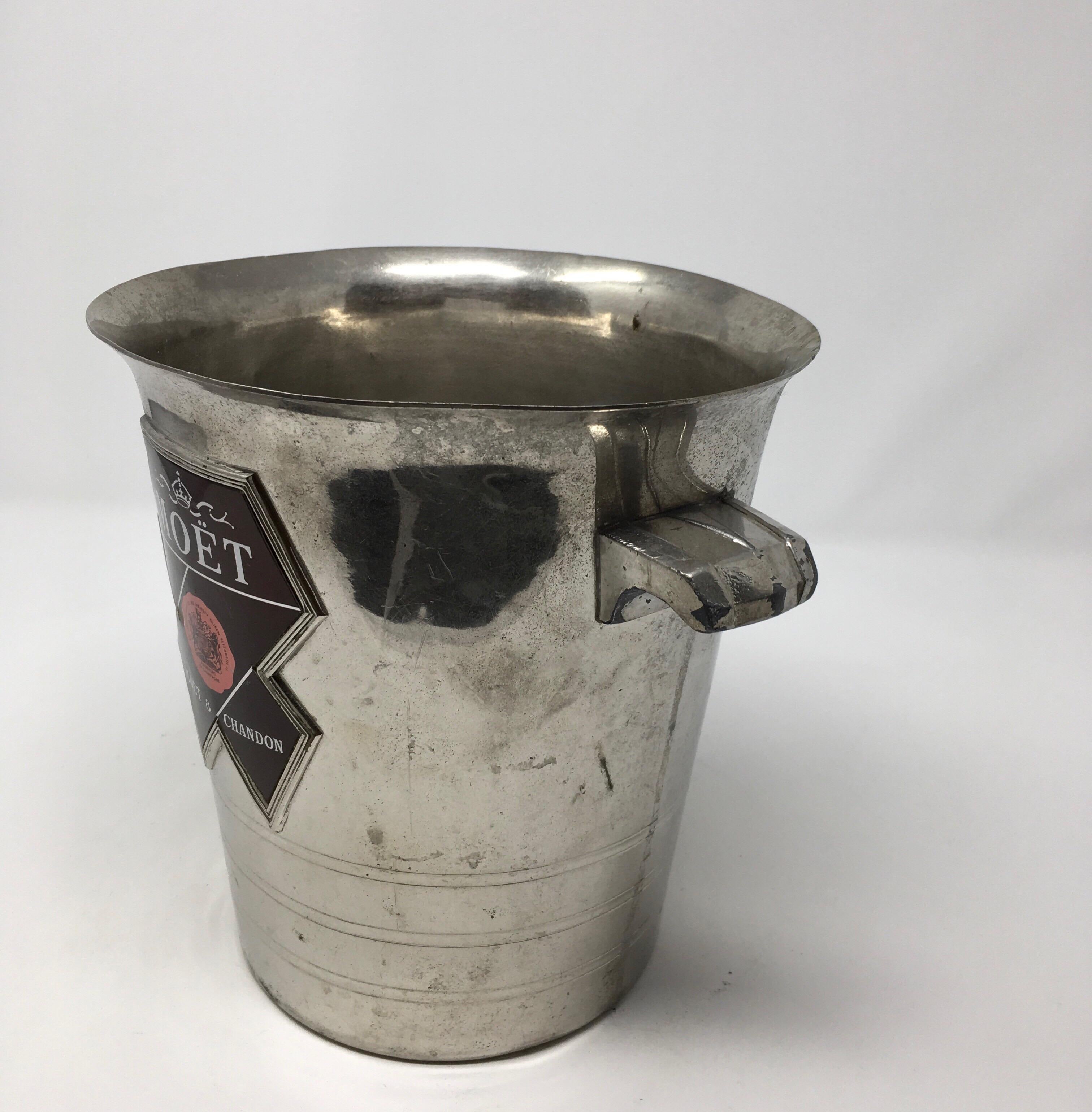 Vintage Moet & Chandon Champagne or wine cooler with silver finish and two handles. It has a nicely worn finish and would be perfect for a bar, wine room or kitchen.