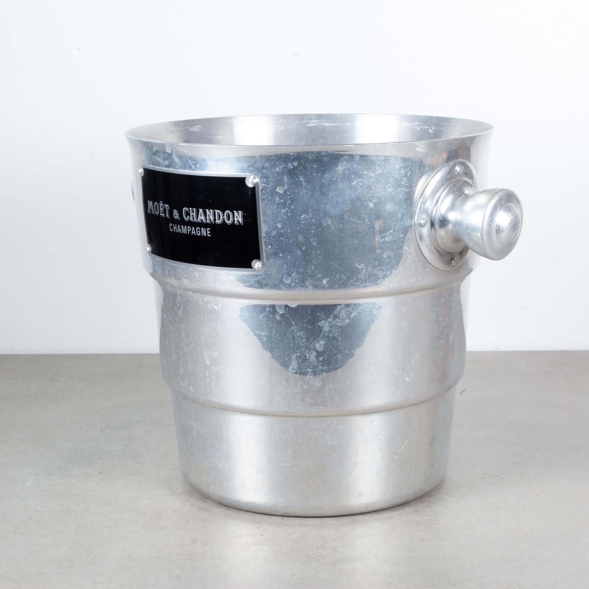 ABOUT

An original aluminum champagne ice bucket with metal Moet & Chandon plate and handles.

    CREATOR Selecto Lot, Made in Belgium.
    DATE OF MANUFACTURE c.1940-1950.
    MATERIALS AND TECHNIQUES Aluminum, Metal.
    CONDITION Good. Wear
