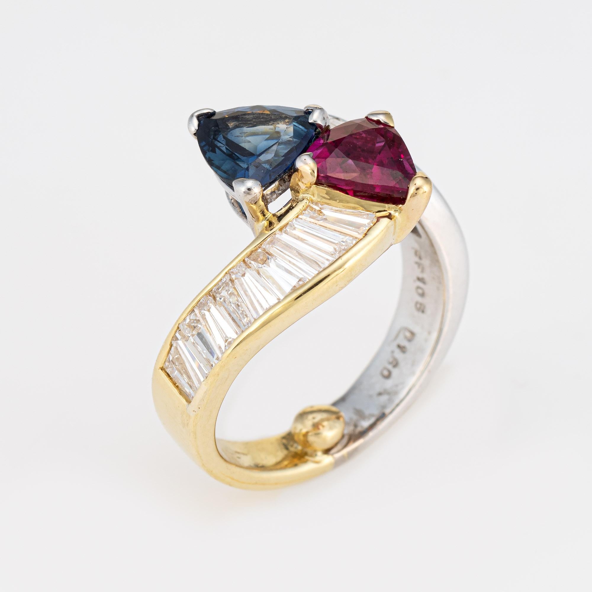 Finely detailed vintage natural ruby & sapphire 'moi et toi' ring crafted in 18k yellow & white gold (circa 1980s to 1990s).  

One triangle brilliant cut natural ruby, approx. 1.30 carats (6.5 x 4.1mm), dark red color, lightly included, good cut,