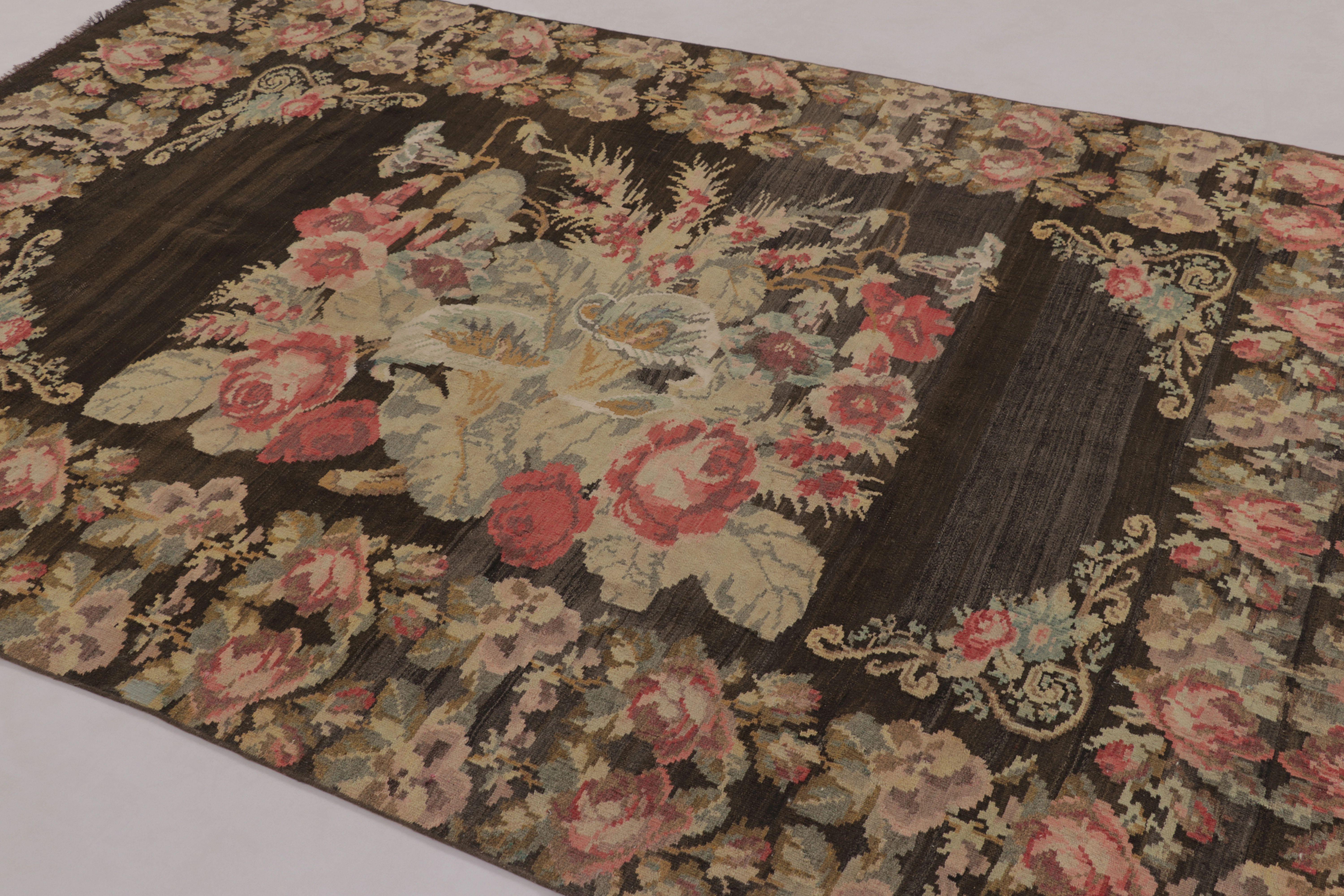 Handwoven in wool and originating from Moldova circa 1950–1960, this beautiful vintage Moldovan Kilim and flatweave rug is a particularly special new curation from Rug 
Kilim's European rug collection—a rare, grand floral design and one of few