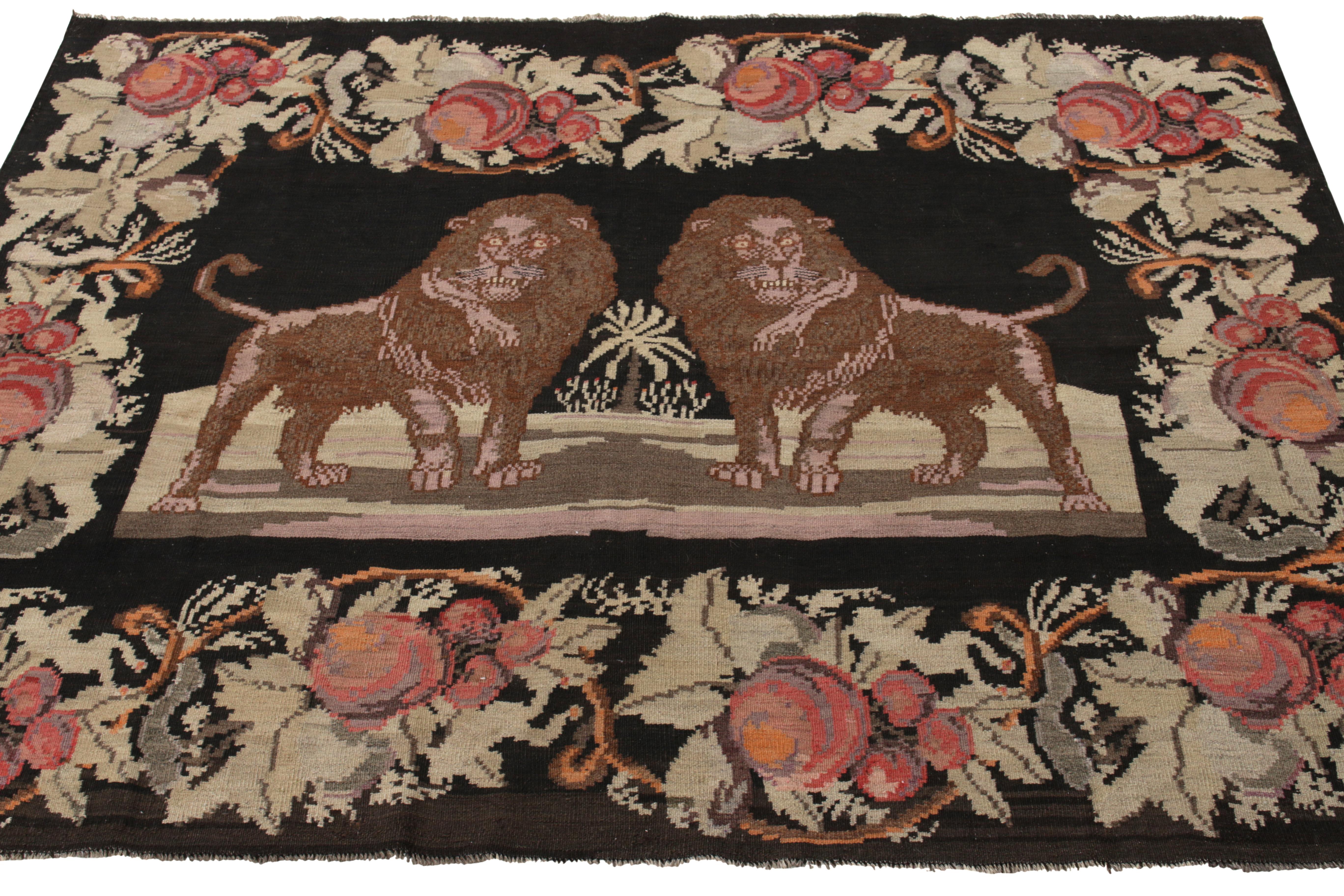Bearing Classic aesthetics from Turkey circa 1950-1960, this 5 x 6 vintage Kilim rug relishes the finesse of Moldovian craftsmanship with Bessarabian influences. Featuring rare pictorial representation of lions with a traditional Art Nouveau floral
