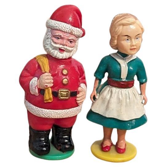 Vintage Mommy küsst Santa Plastikfiguren mit Schachtel. im Angebot