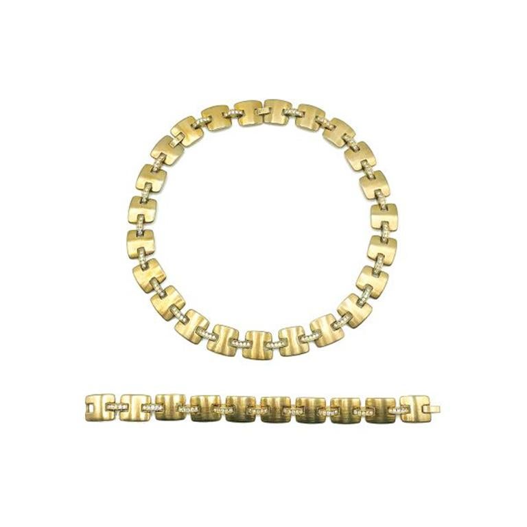 A perfectly timeless Vintage Monet necklace and matching bracelet. Crafted in brushed gold plated metal with crystal accents. In very good vintage condition, signed, Necklace 47cms, bracelet 19.5cms A wonderfully chic look from Monet that will prove