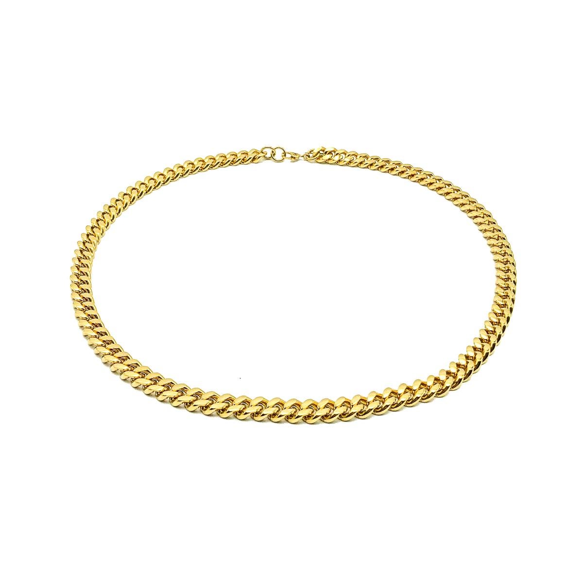 A Vintage Monet Flattened Curb Link Chain. Crafted in gold plated metal. Substantial and wonderful quality. Very good vintage condition, signed, 45cms. Wonderfully stylish for all occasions. 

Established in 2016, this is a British brand that is
