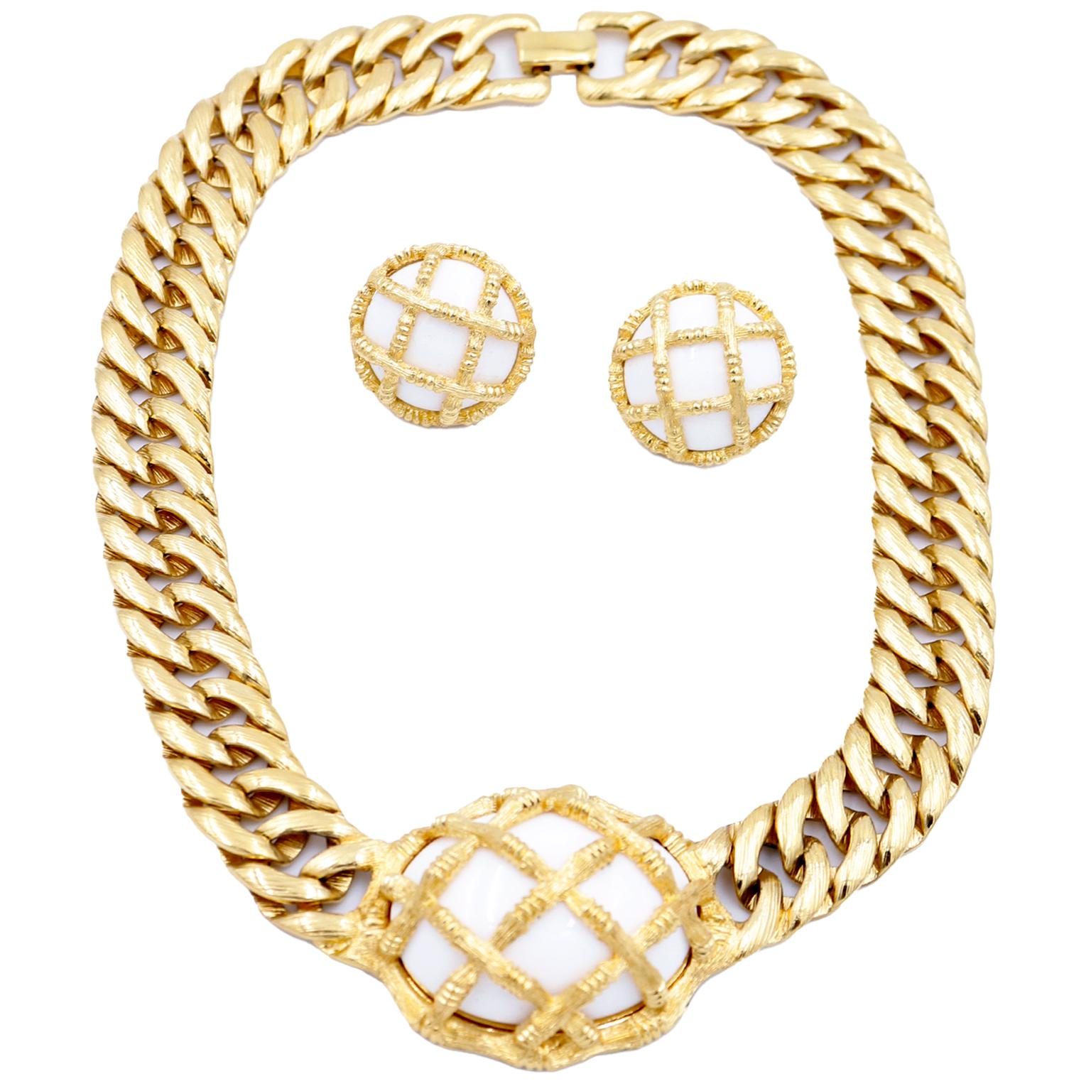 This is a really unique vintage 1980's Monet gold necklace and earring set with white caged domes nicely contrasting the luxe gold. Vintage Monet jewelry is made so well and they used only  the finest costume jewelry materials. When you compare a