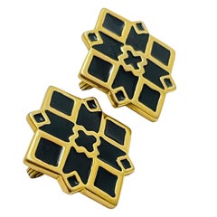 Vintage MONET gold enamel clip on earrings