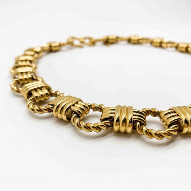 A Vintage Monet Rope Necklace from the 1980s. A fabulous example of Monet jewellery from the iconic 80s. Featuring high quality gold plated metal interlocking rope design chains. In very good vintage condition, measuring approx. 49cm and signed. A