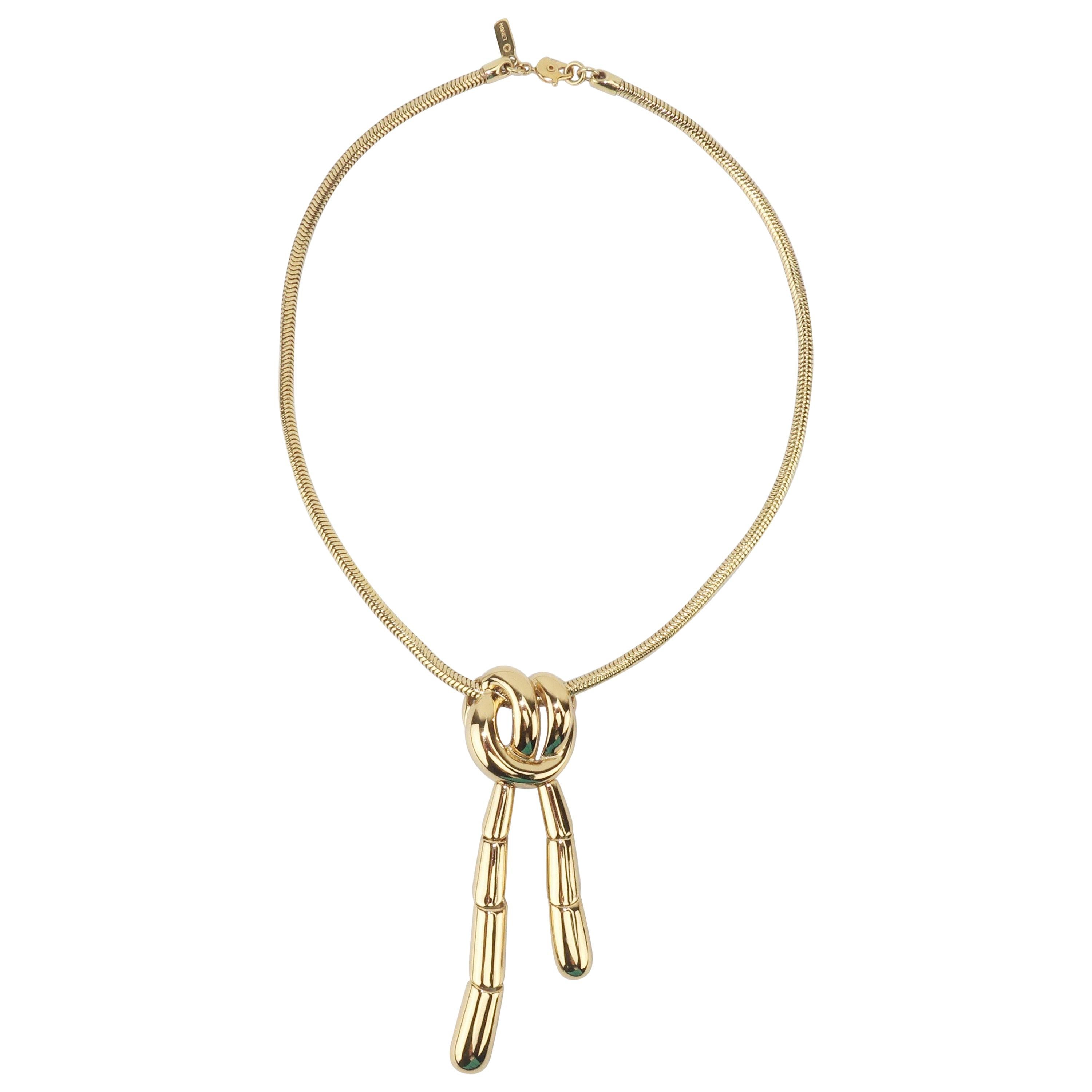 Vintage Monet Gold Tone Articulated Knot Necklace