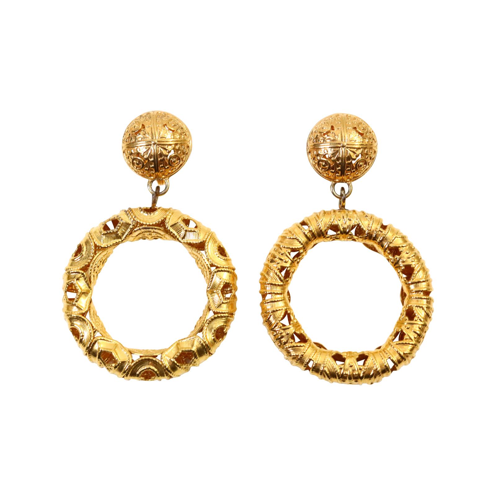 Vintage Monet Gold Tone Dangling  Etruscan Hoop Earrings Circa 1980s.  These are such well made classic earrings.   The clip is also well constructed.  People don't know or forget that Monet originally made the jewelry for YSL so look at the