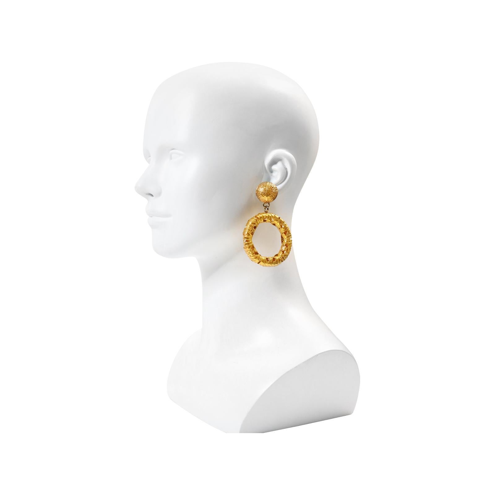 Modern Vintage Monet Gold Tone Dangling  Etruscan Hoop Earrings Circa 1980s For Sale
