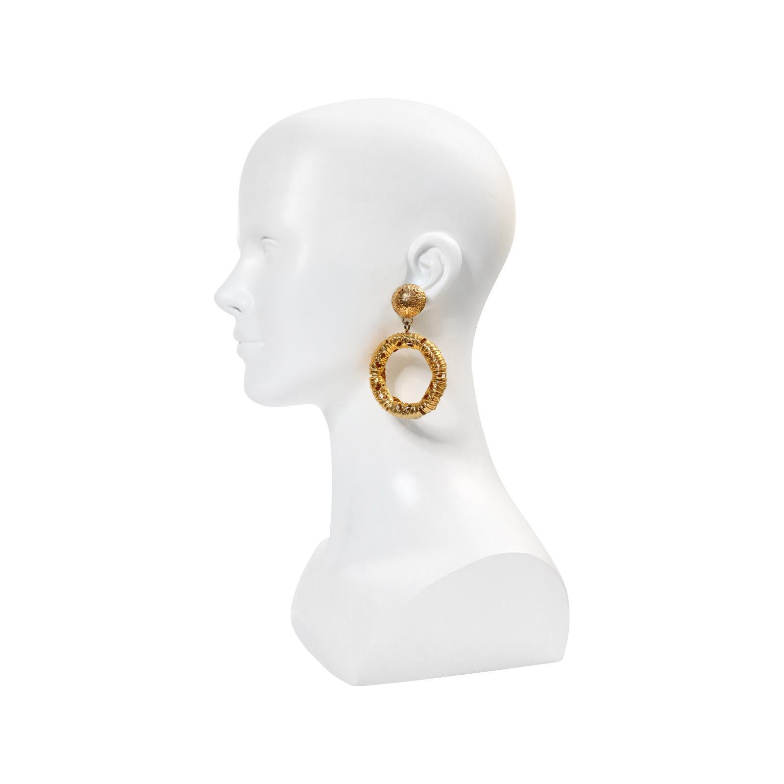 Vintage Monet Gold Tone Dangling  Etruscan Hoop Earrings Circa 1980s In Good Condition For Sale In New York, NY
