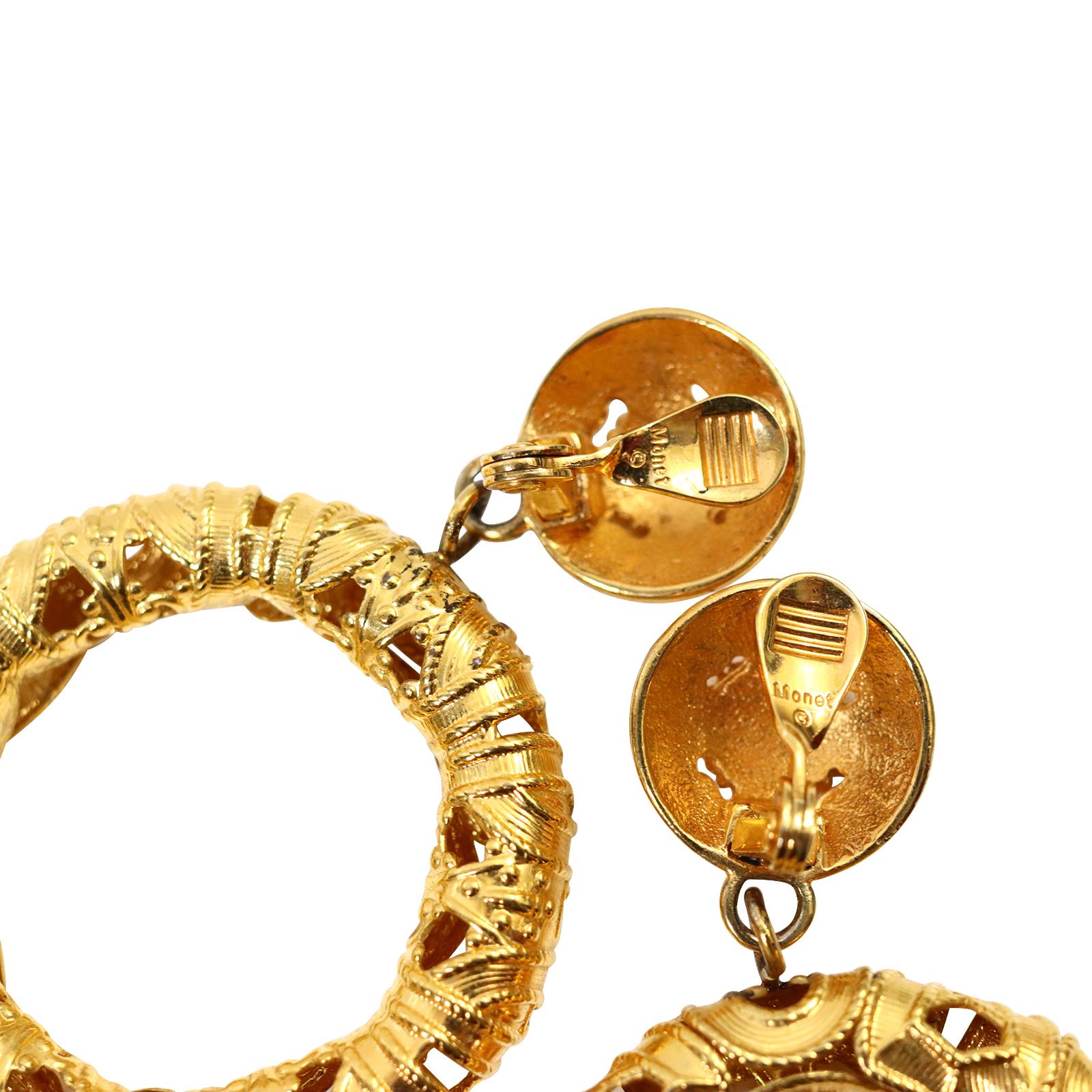 Vintage Monet Gold Tone Dangling  Etruscan Hoop Earrings Circa 1980s For Sale 1