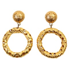 Vintage Monet Gold Tone Dangling  Etruscan Hoop Earrings Circa 1980s
