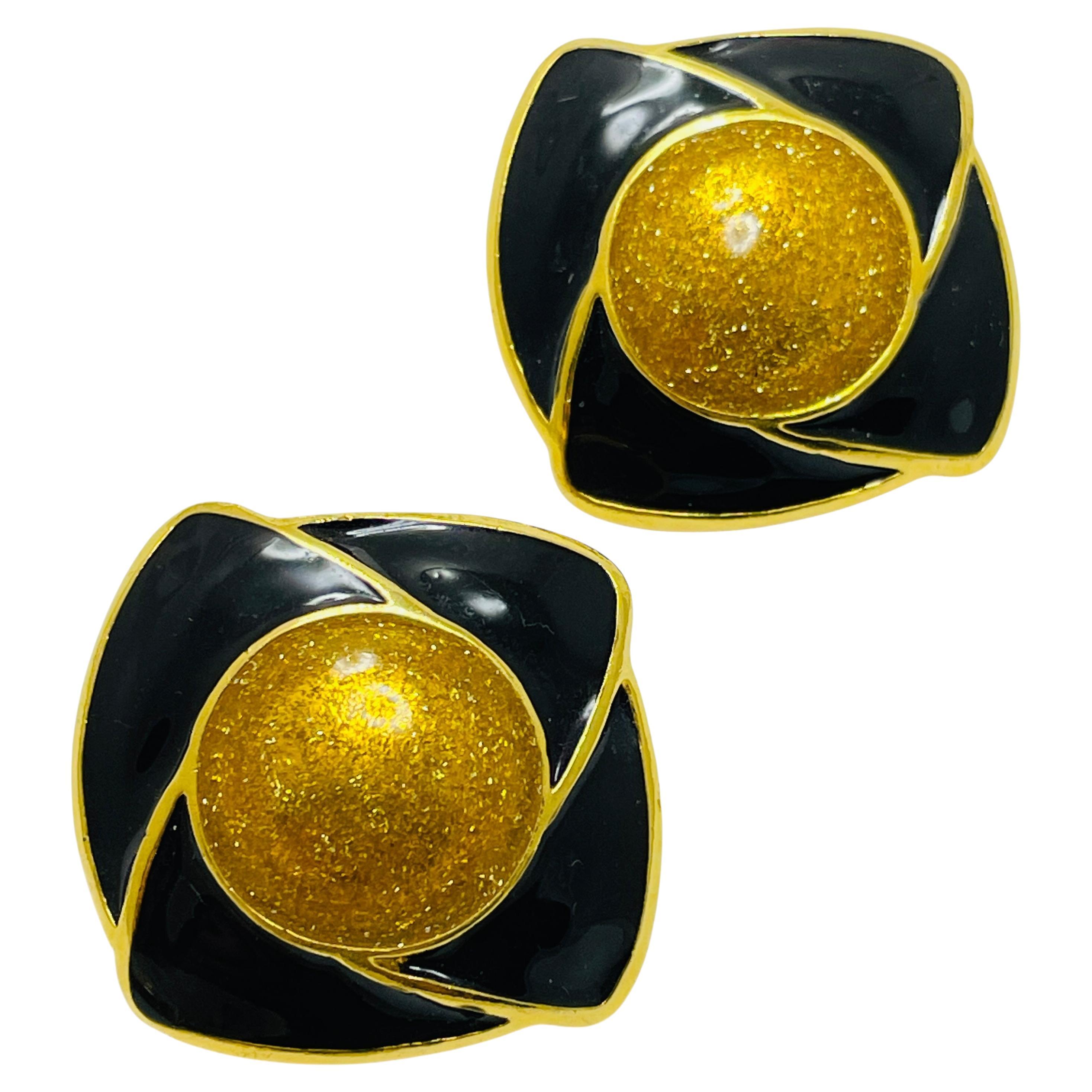 Vintage MONET gold tone enamel designer runway earrings For Sale