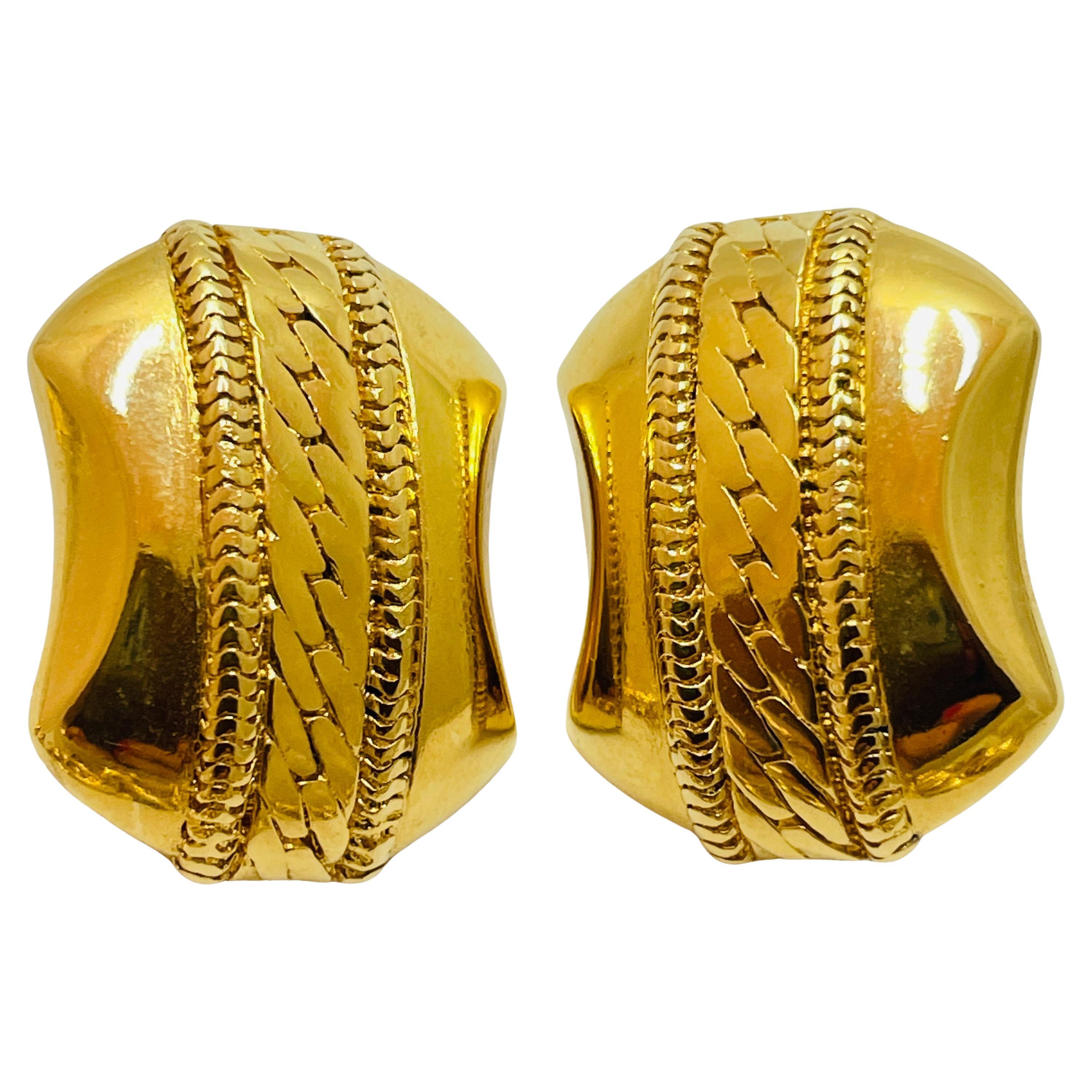 Vintage MONET gold clip on earrings For Sale