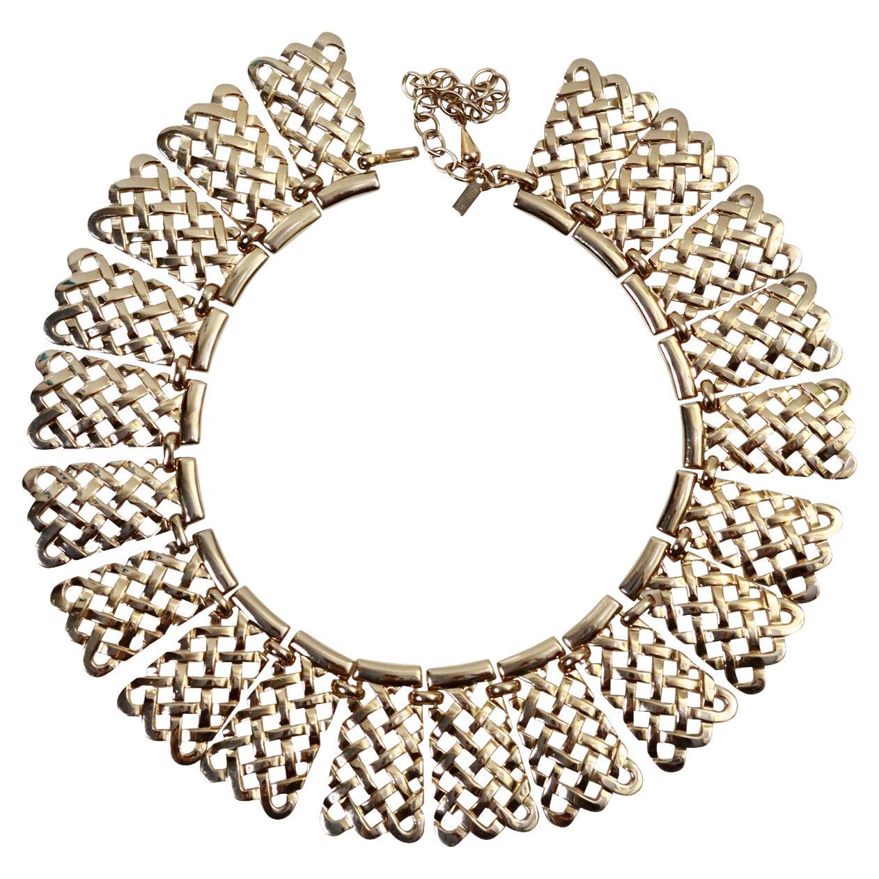 Vintage Monet Lattice Collar Necklace Circa 1980s. This gold necklace looks great with anything. Has a great look on a t-shirt or a white blouse or dressed up. Monet made the jewelry  for YSL in the 1980s and you can see some of the designs carry