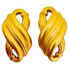 Vintage MONET matte gold designer clip on earrings