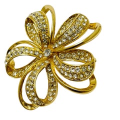 Vintage MONET signed flower gold tone rhinestones designer brooch
