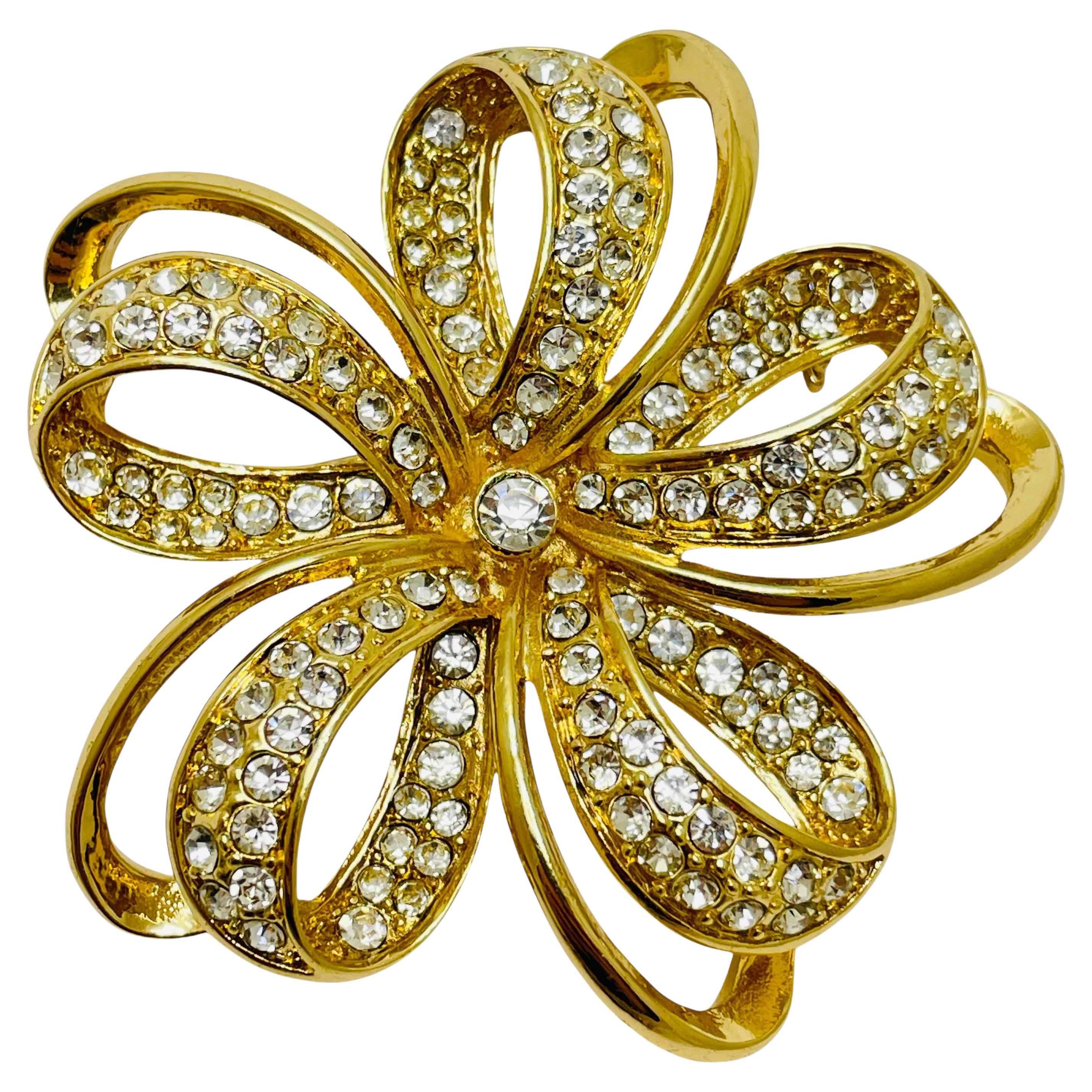 Vintage MONET signed flower gold tone rhinestones designer brooch For Sale