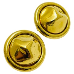 Vintage MONET signed gold tone designer clip on earrings