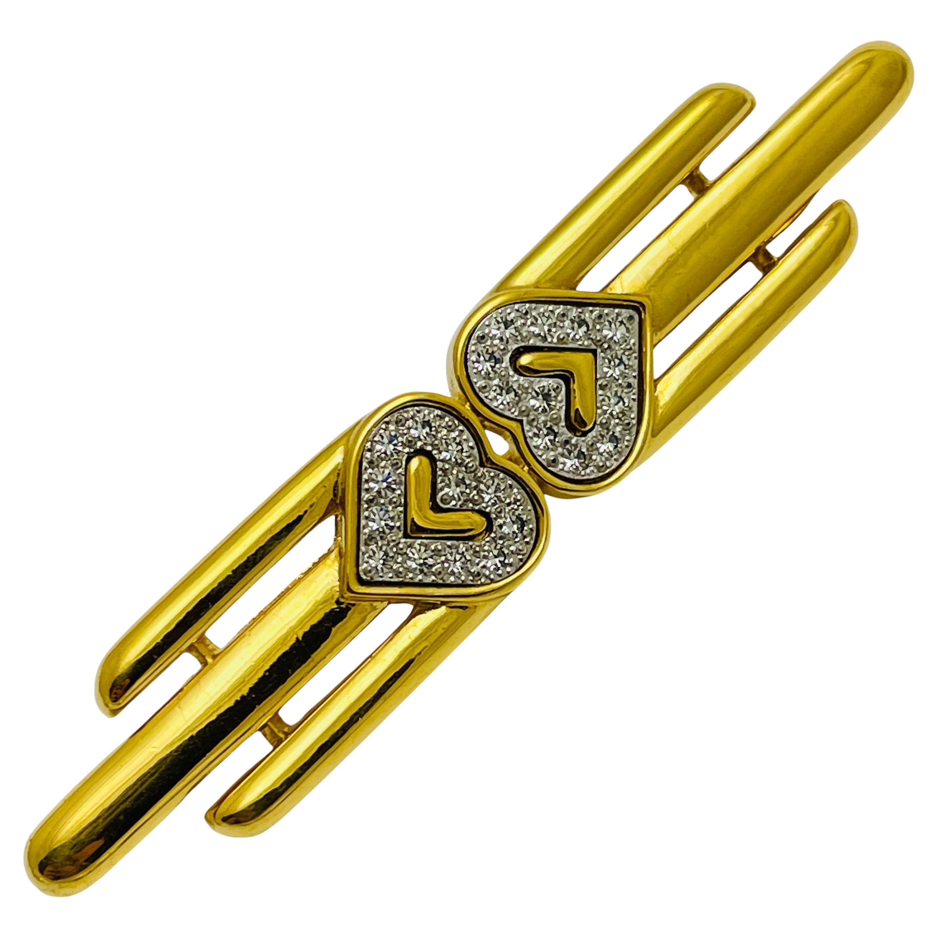 Vintage MONET signed gold tone rhinestones designer brooch For Sale