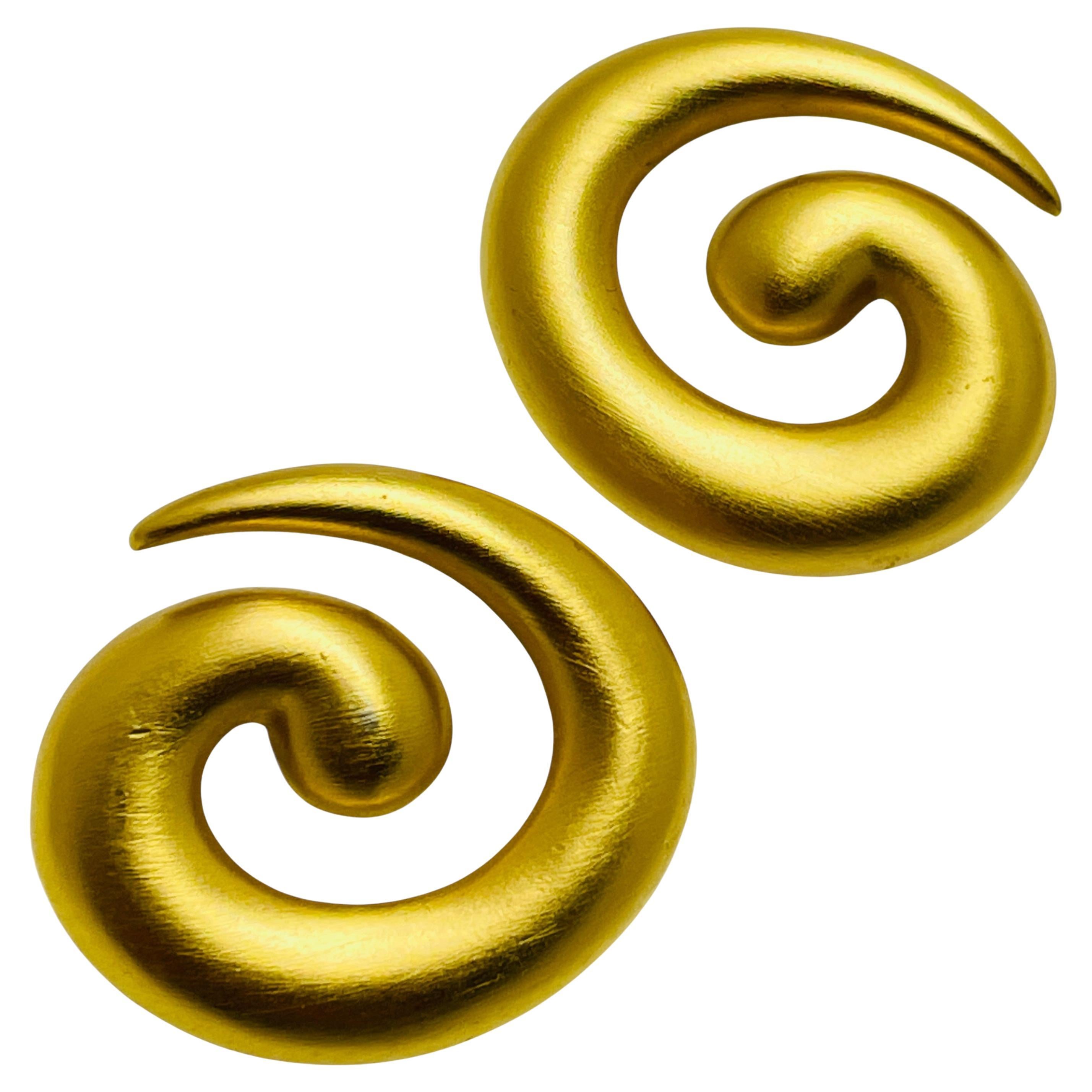 Vintage MONET signed matte gold tone swirl modern designer earrings For Sale
