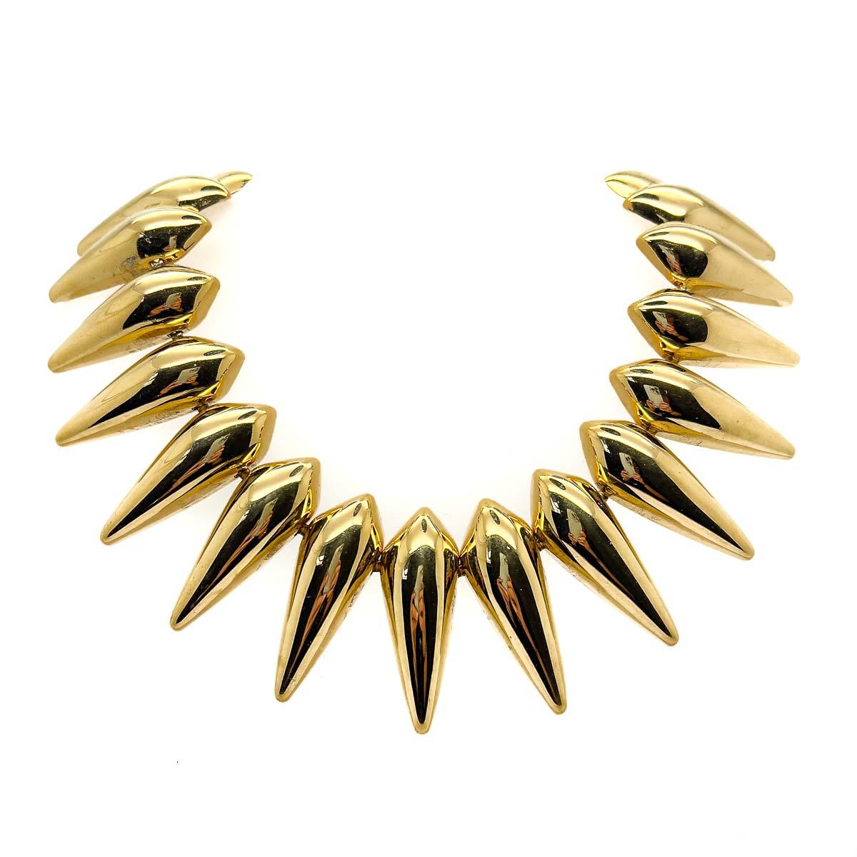 A spectacular and rare Vintage Monet Sunburst Collar and Cuff, one of Monet's most impressive designs. Lustrous high quality gold plate is the perfect finish for this glamorous yet contemporary stylised sunburst design. An eternally stylish piece of