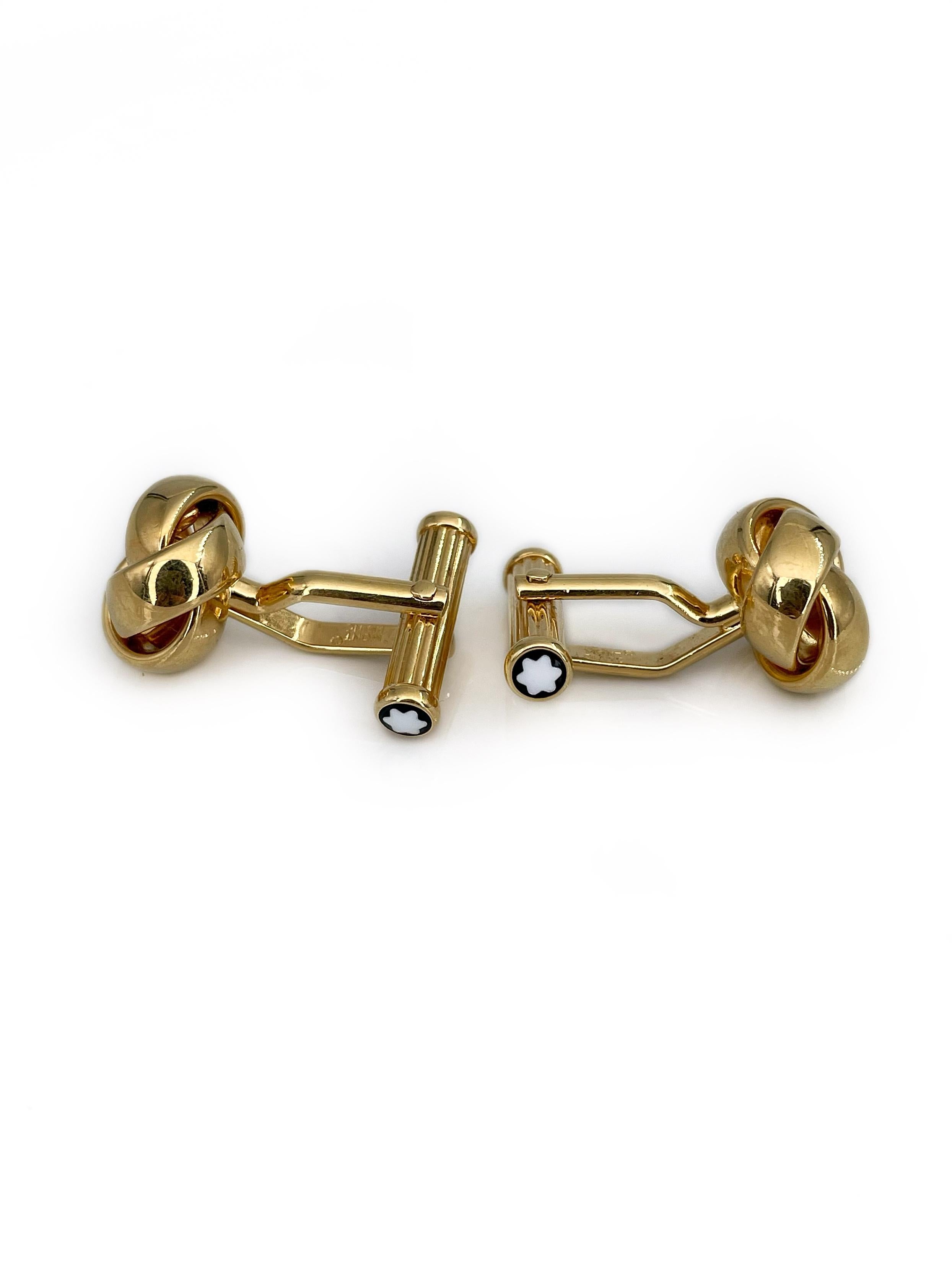 This is a classic pair of round twisted knot cufflinks designed by Montblanc in 2000’s. The piece is gold plated. The cufflinks fasten with a T-bar. 

Signed: “Mont Blanc. Germany”

Perfect gift for a man. 

Head diameter: 1.3cm

———

If you have