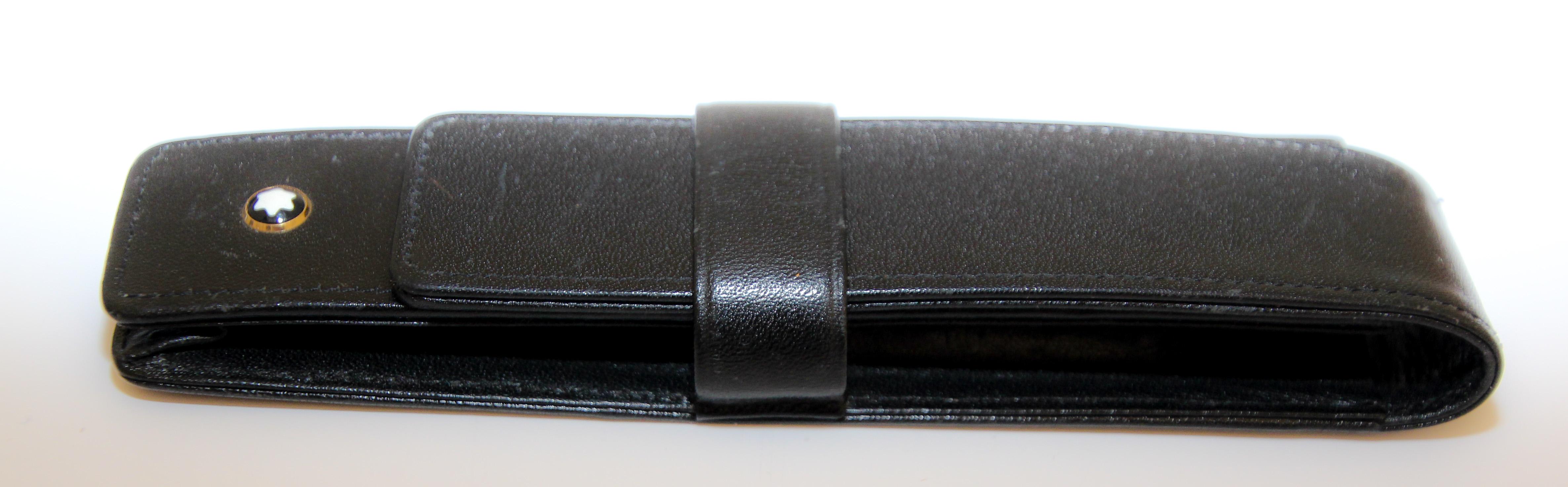Vintage Montblanc Meisterstuck black Pen Pouch for one writing Instrument.
Montblanc Meisterstuck Series of leather goods, German, full-grain calfskin in unique, deep-gloss Montblanc. black, with Montblanc Metal fittings /logo: Black and white