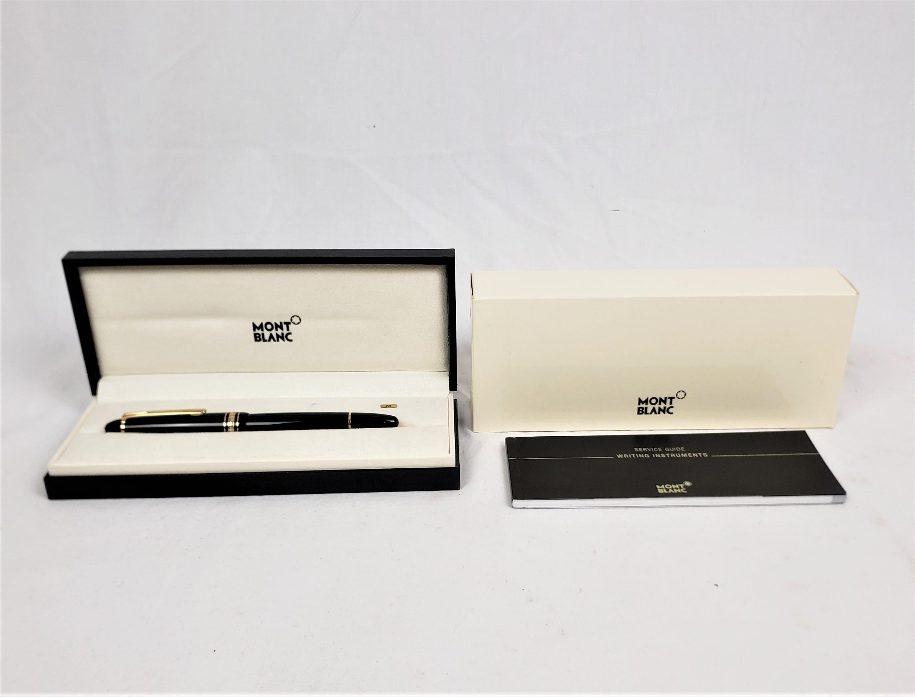 This fountain pen was made by the well known Montblanc factory of Germany in approximately 1990 in their classic modern style. This fountain pen is their 'Meisterstuck' model and has a black molded case with gold clip and band, and a 14 karat gold