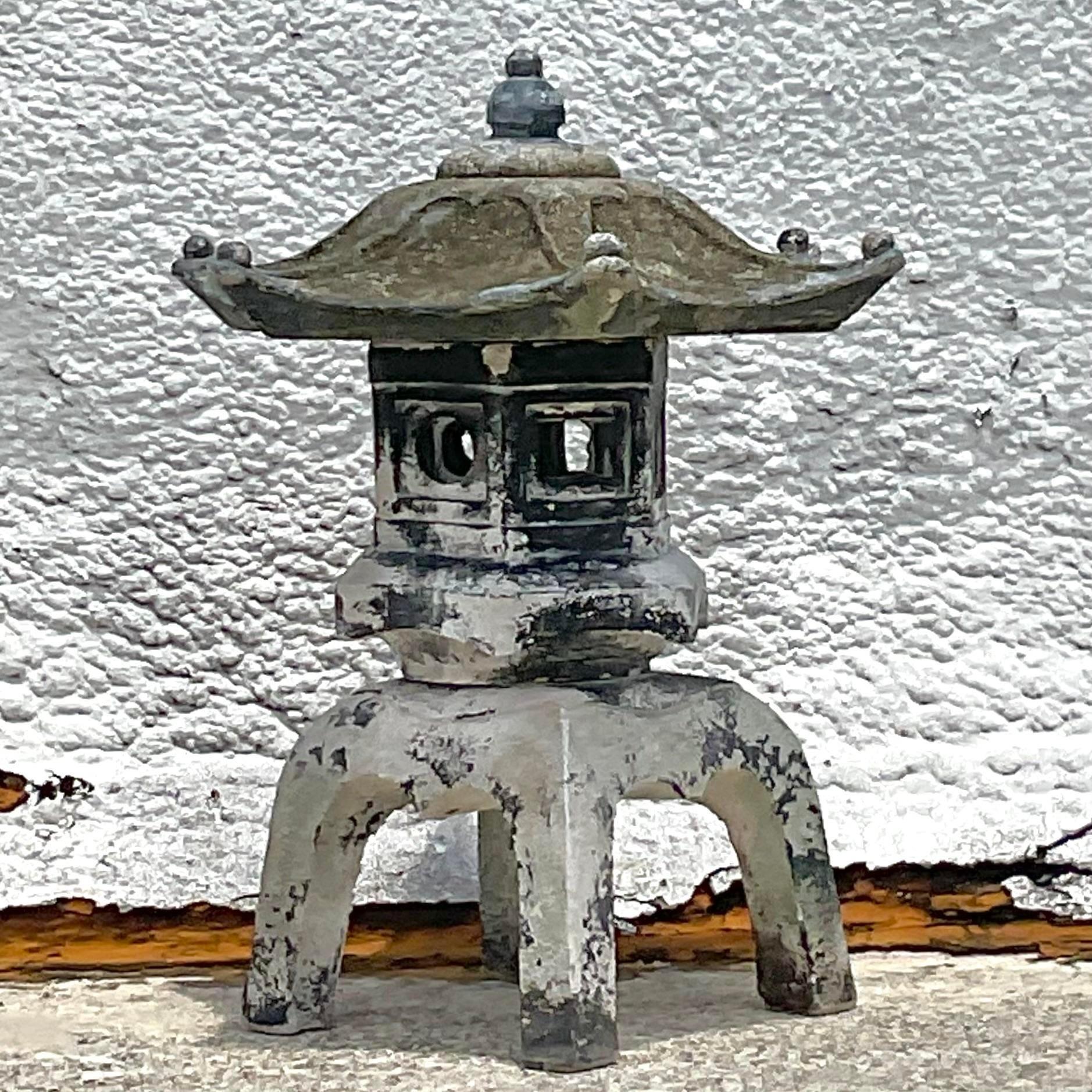A fabulous vintage Asian Cast concrete pagoda. A chic stacked set of three pieces that create this monumental garden ornament. Gorgeous all over patina from time. Acquired from a Palm Beach estate