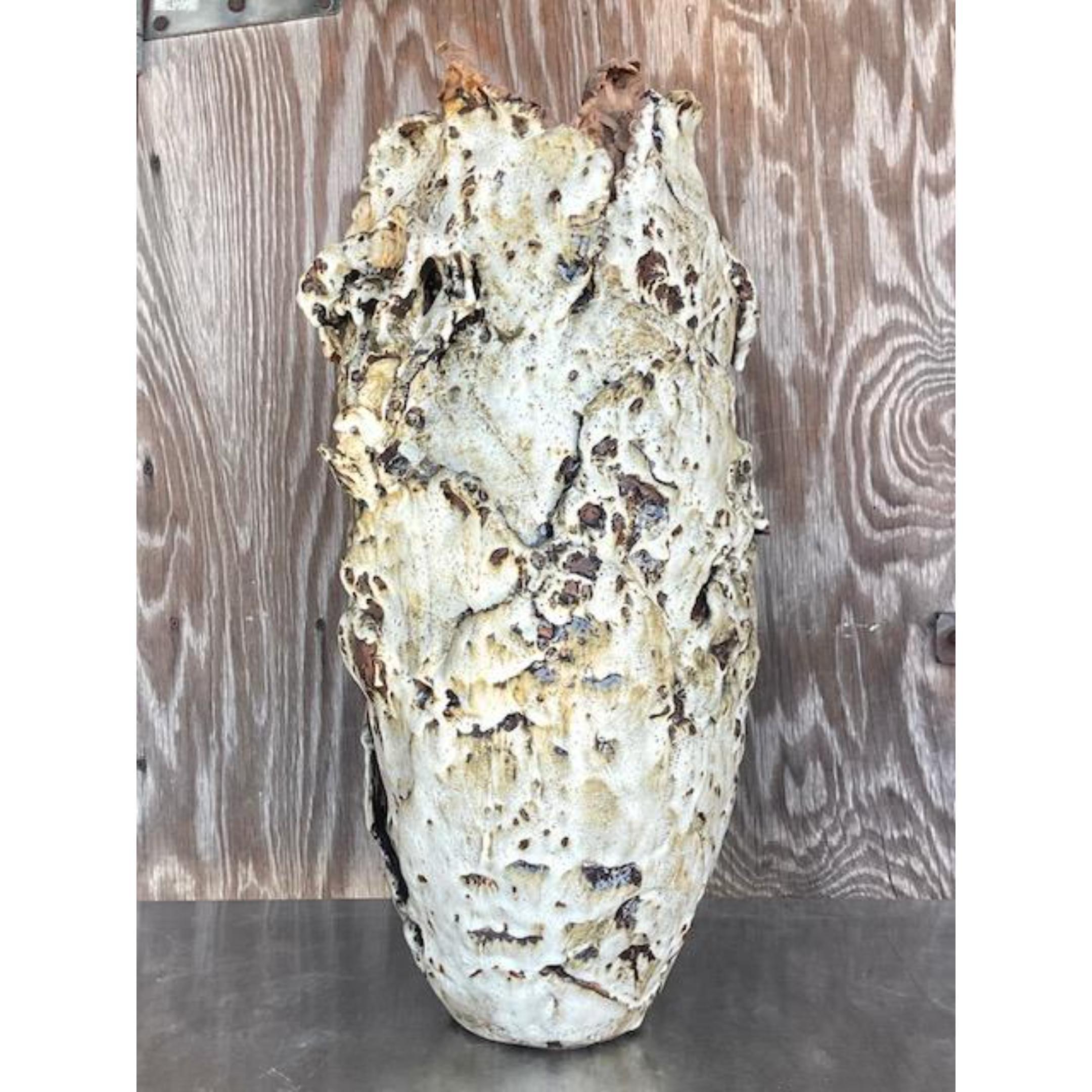 An extraordinary vintage Boho vase. A chic slab built creation with an incredible textured and layered finish. A striking addition to any space. Acquired from a Palm Beach estate.