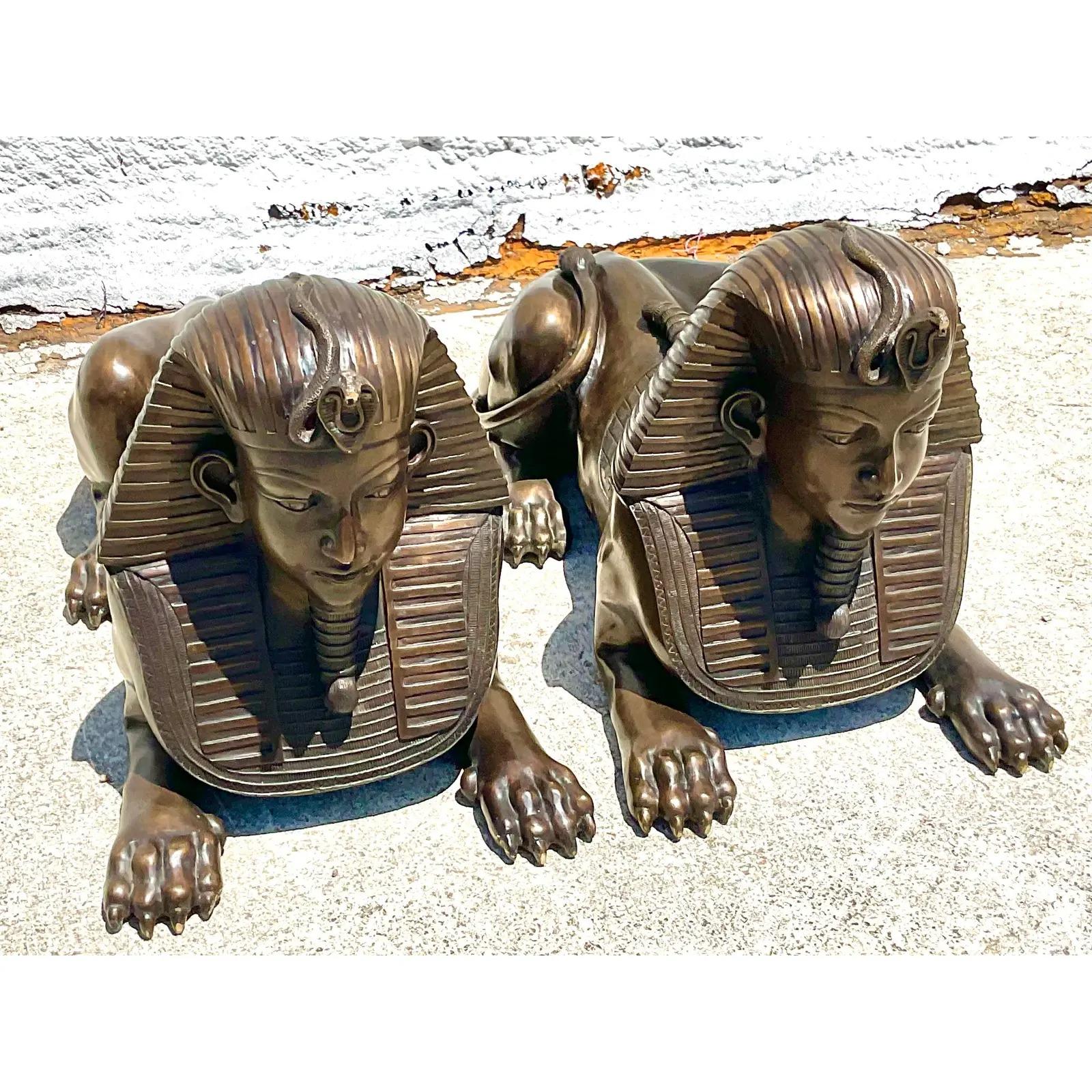 Fantastic pair of vintage bronze sculptures. A magnificent pair of monumental sphinxes. Massive and dramatic. Perfect to add some glamour and drama to any entrance or doorway. Acquired from a Naples estate.