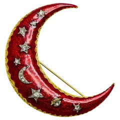 Vintage moon gold tone red enamel rhinestone designer brooch