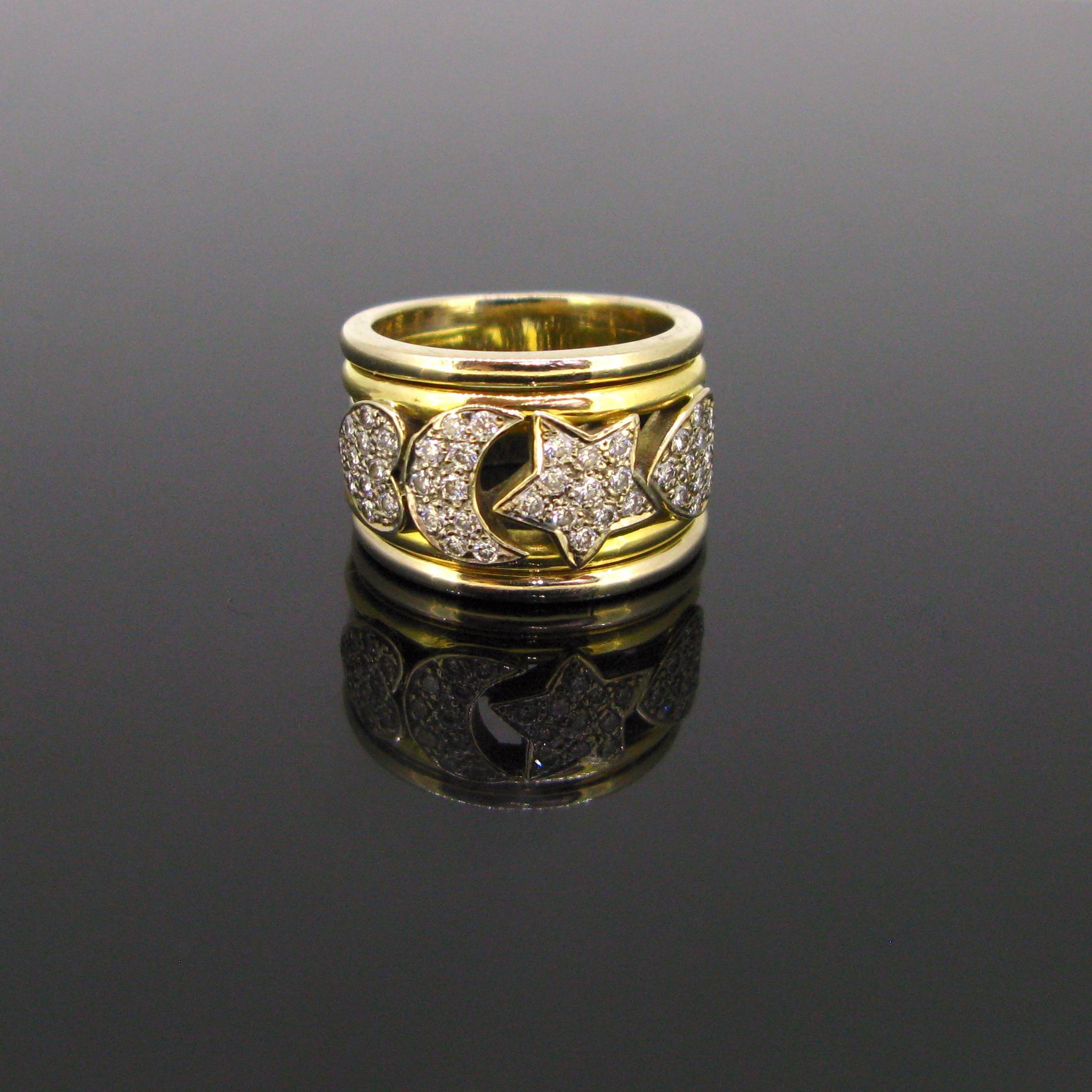 Weight:	16.95gr

Metal:	18kt yellow and white gold

Stones:	43 Diamonds
•	Cut:	Brilliant
•	Carat:	1ct approximately
•	Colour:	G/H
•	Clarity:	VS

Condition:	Very Good

Hallmarks:	750

Comments:	This vintage ring is made in 18kt white and yellow gold.