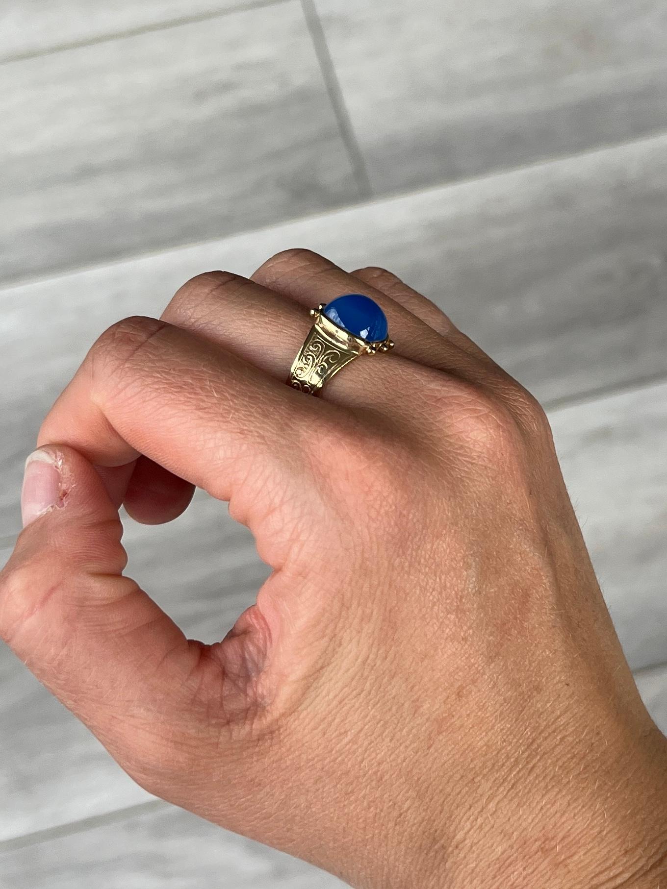 The stunning moonstone in this ring has the most beautiful blue glow. The setting is ornate and the band is engraved. Hallmarked London 1973. The inside of the ring reads 'Mary 1825' so maybe this is a remembrance ring of some kind. 

Ring Size: P