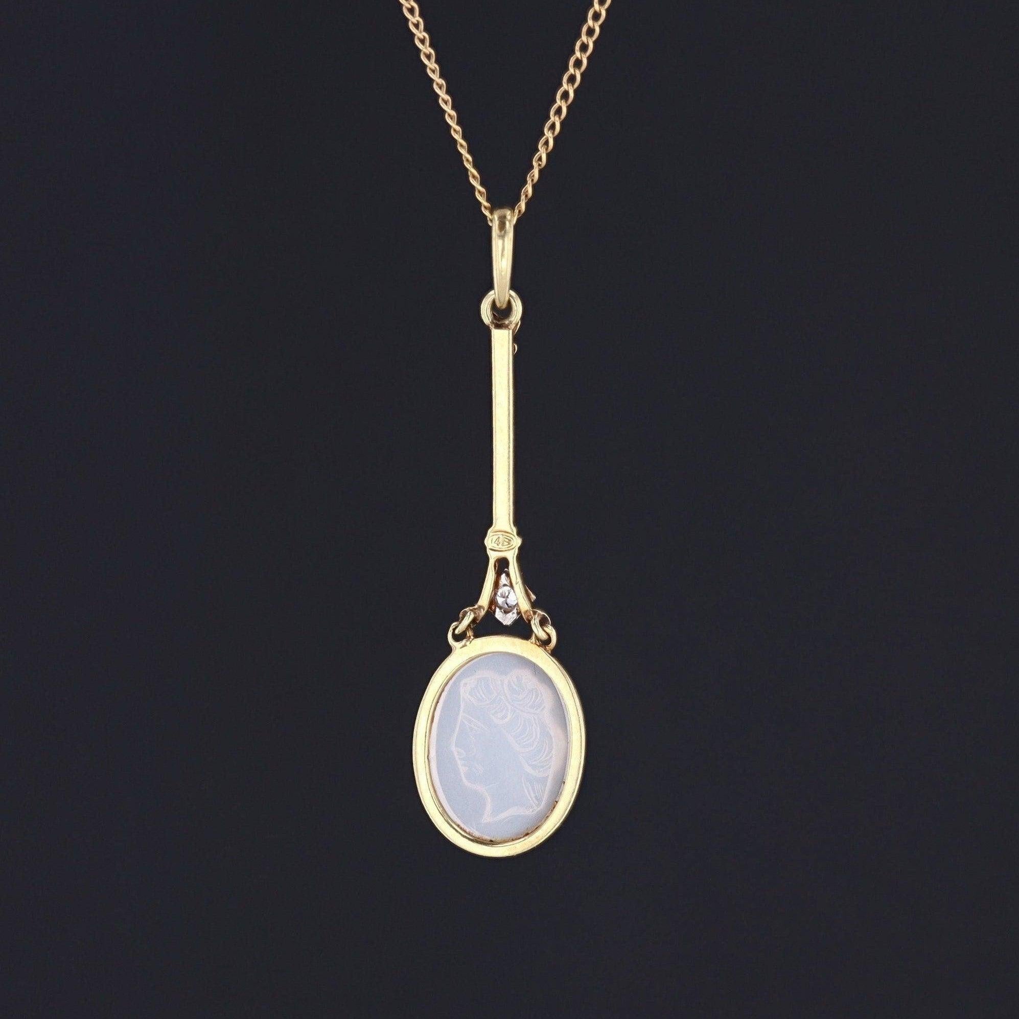 Art Deco Moonstone Cameo Pendant in 14k Gold with Diamond Accent (Circa 1920–1930)

 A luminous tribute to feminine grace, carved in ethereal moonstone and framed in fine gold.  This exceptional pendant from the Art Deco period features a