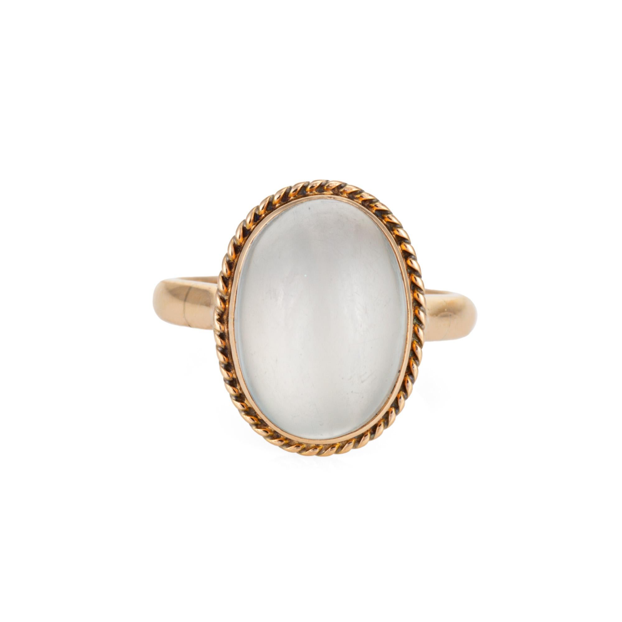 Stylish mid-century moonstone cocktail ring crafted in 18 karat yellow gold. 

Cabochon moonstone measures 12mm x 10mm. The moonstone is in very good condition and free of cracks or chips. 

The beautiful luminous moonstone glows with every movement