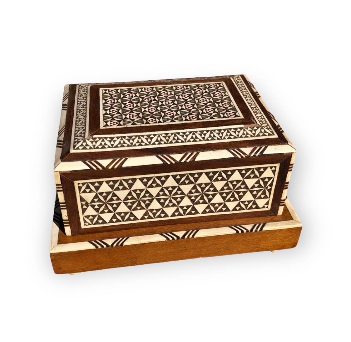 Vintage Moorish Syrian style cigarette music box inlaid with mother of pearl, bone and ebony. Handcrafted very fine Moorish micro mosaic inlaid geometric marquetry artwork. Made in Spain Granada using the Middle Eastern work. These boxes are used to