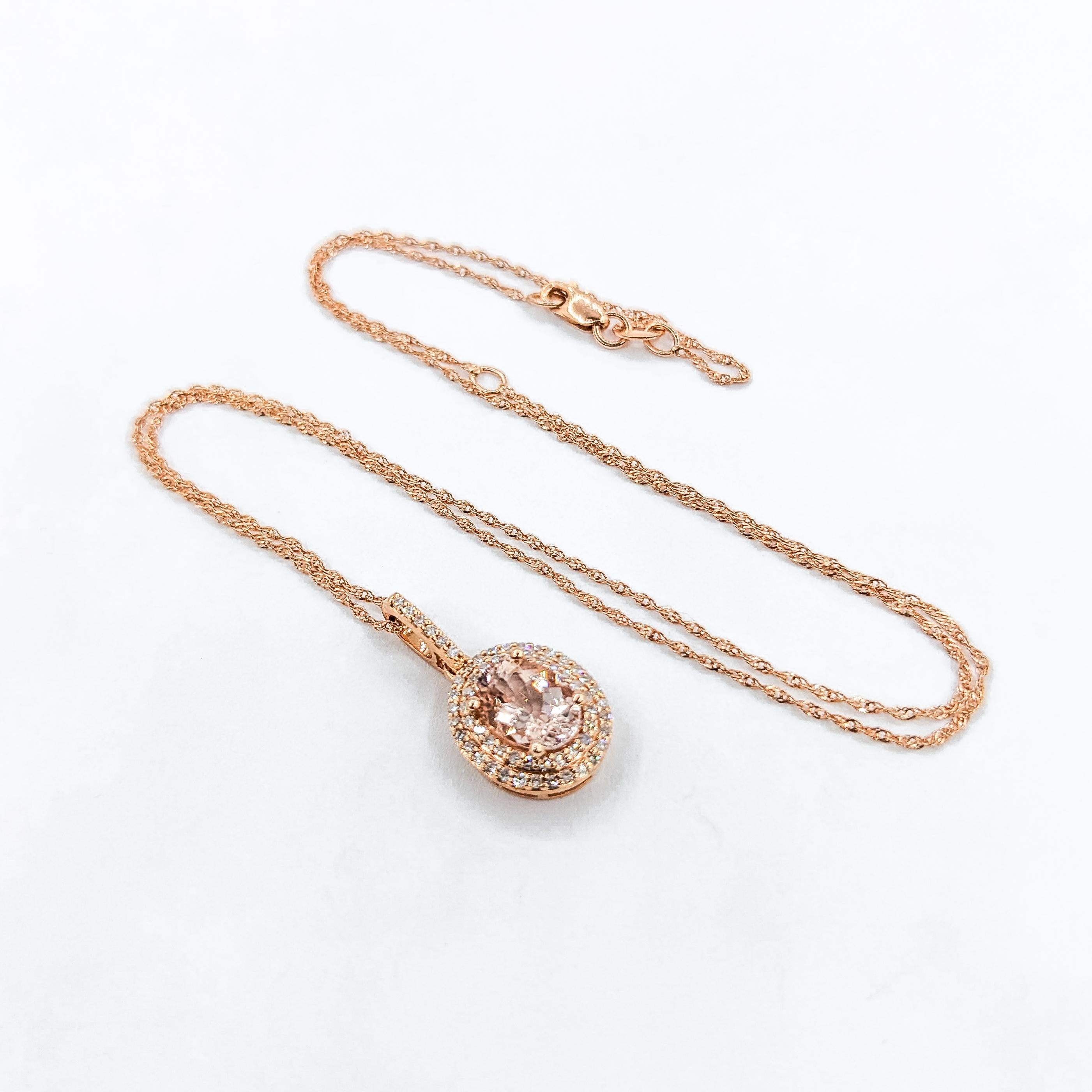 Vintage Morganite & Diamond Halo Necklace in Rose Gold

Introducing our elegant Morganite & Diamond Pendant in 14K Rose Gold. This piece features a 1.10 carat Morganite adorned by 0.21 carats of glittering Diamonds in the form of a double halo. The