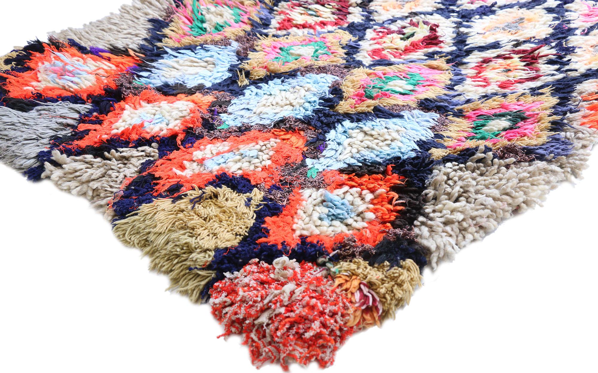 20842, vintage Moroccan Azilal rug, Berber colorful Boucherouite rug with tribal style. This vintage Moroccan Azilal rug features a column of seven diamond lattices unfolding across the middle of an abrashed creamy-beige field. The zigzag outlines