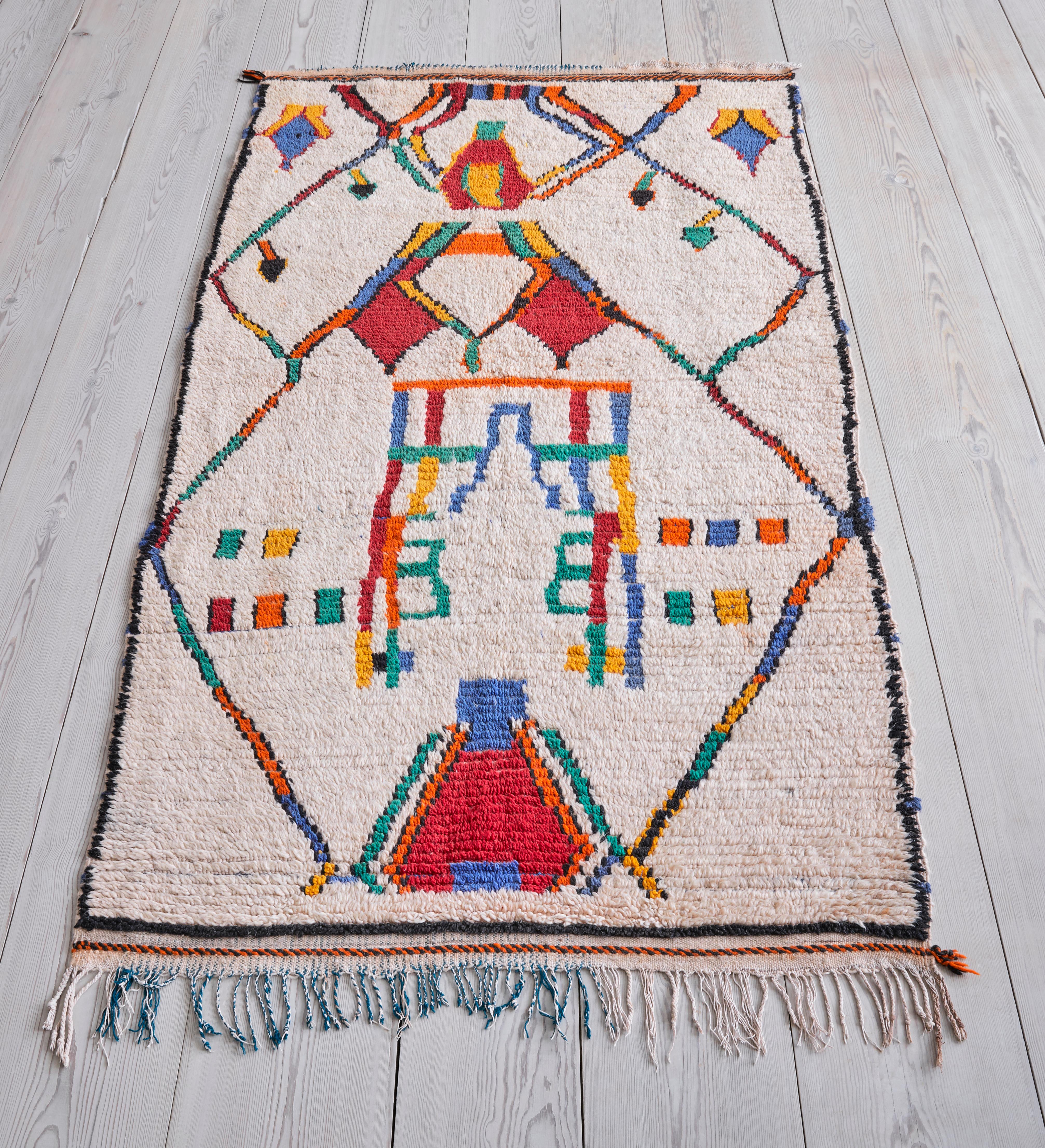 Morocco, vintage

White Azilal rug with pattern in primary colors.

Measures: H 221 x W 128 cm.