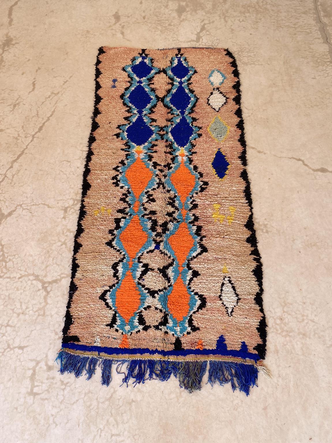 This lovely vintage Azilal runner rug just makes me happy! It shows such joyful colors and classic series of diamonds but with an 