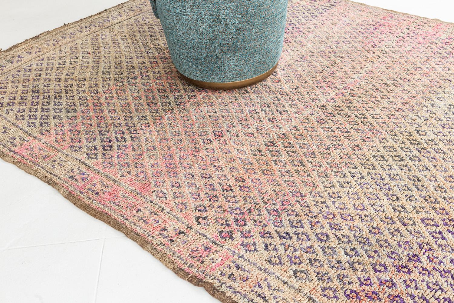 Be captivated by this luxurious Beni M'Guild Rug from our Atlas Collection. lt has an overall diamond pattern through the indigo gradient theme which made it more unique. Spoil your own home into a Middle Atlas Tribe kind of rug that will bring