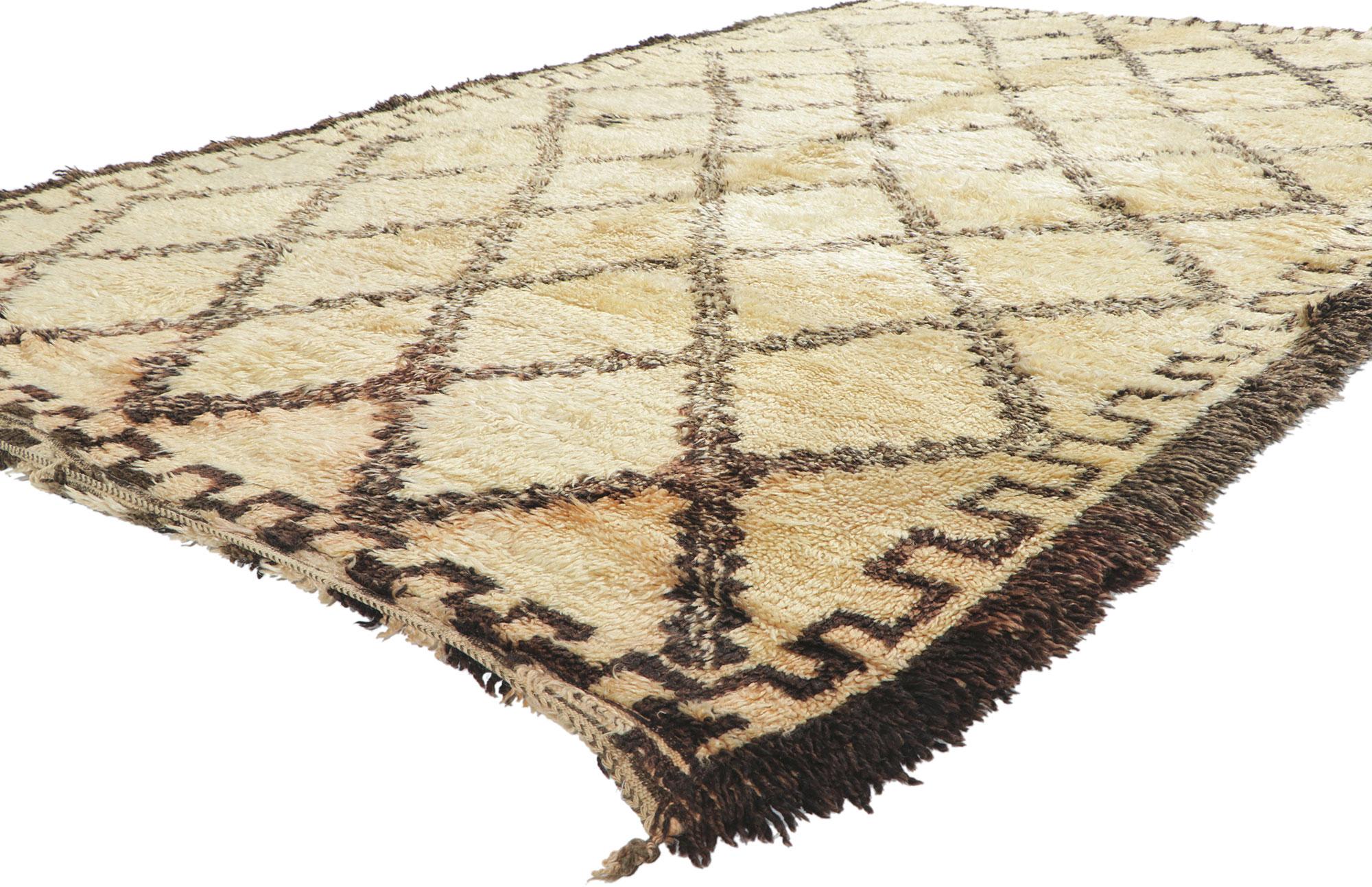 78381 Vintage Moroccan Beni Ourain rug, 06'04 x 10'00. With its simplicity, plush pile, incredible detail and texture, this hand knotted wool vintage Beni Ourain Moroccan rug is a captivating vision of woven beauty. The eye-catching diamond trellis