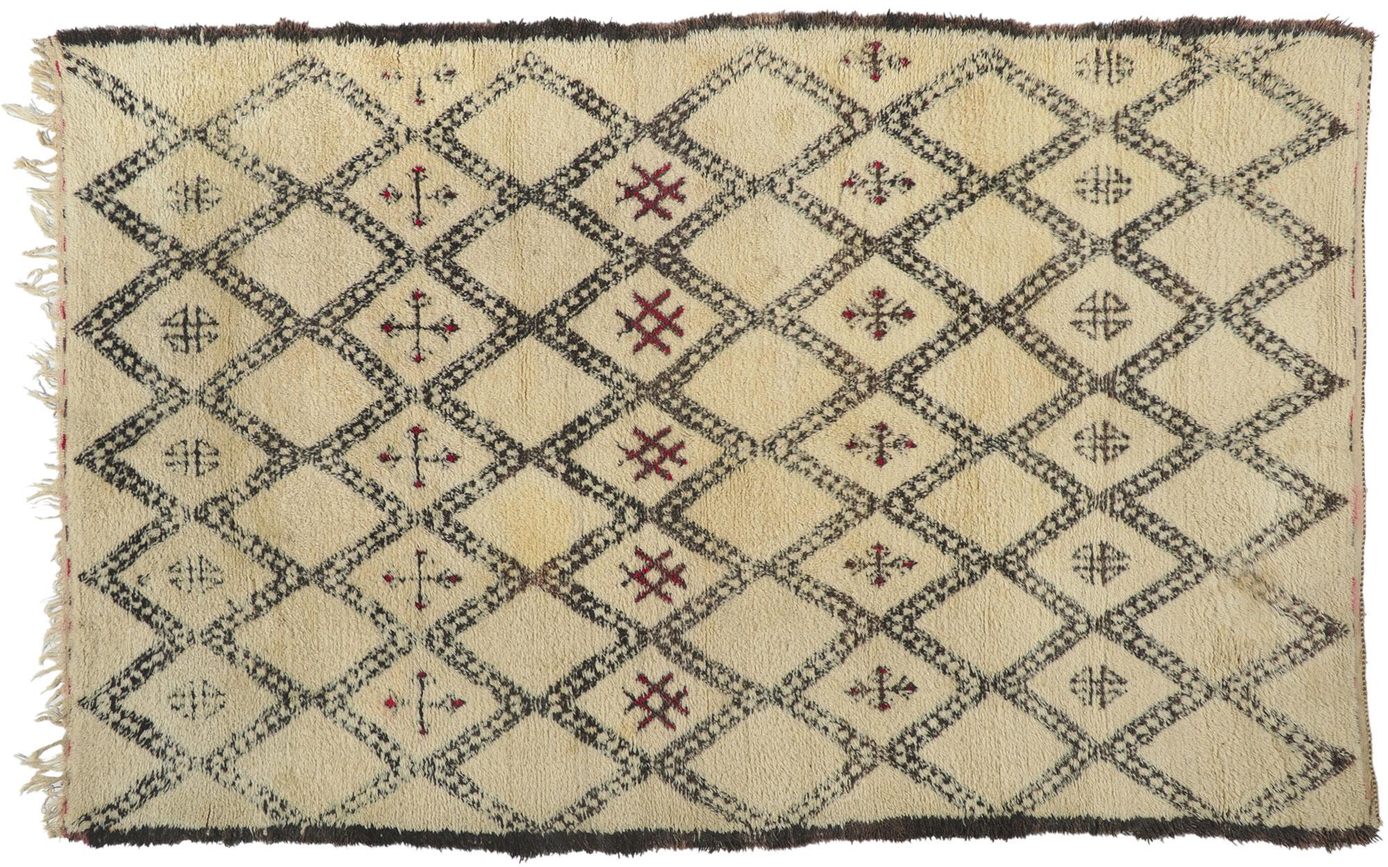 78413 vintage Moroccan Beni Ourain rug, 06'04 x 10'00.
With its simplicity, plush pile, incredible detail and texture, this hand knotted wool vintage Beni Ourain Moroccan rug is a captivating vision of woven beauty. The eye-catching diamond trellis