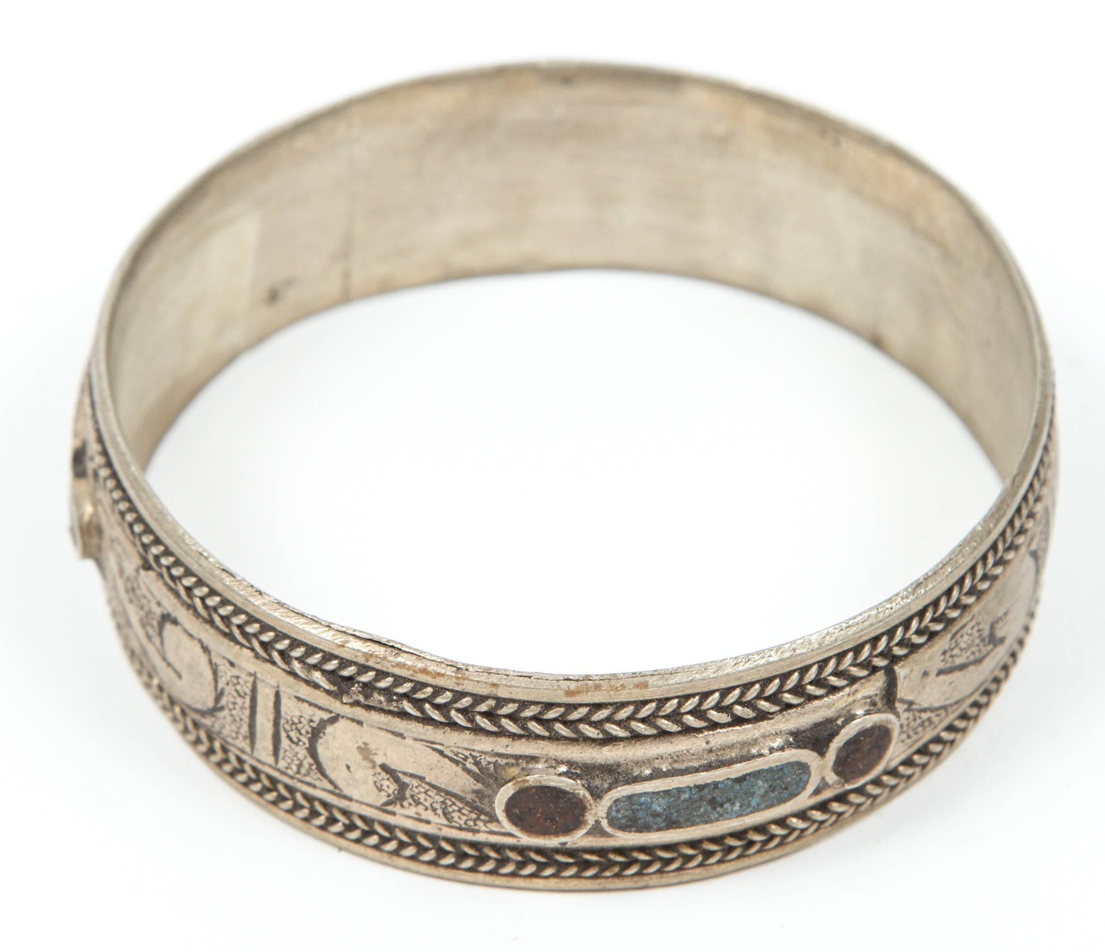 Moroccan Berber tribal bracelet Moroccan tribal bracelet, cuff from the high atlas of Morocco. 
Handcrafted by Berber women using Moroccan silver nickel. 
The ethnic Nomadic and Bedouin jewelry from the Maghreb and North Africa is usually made of