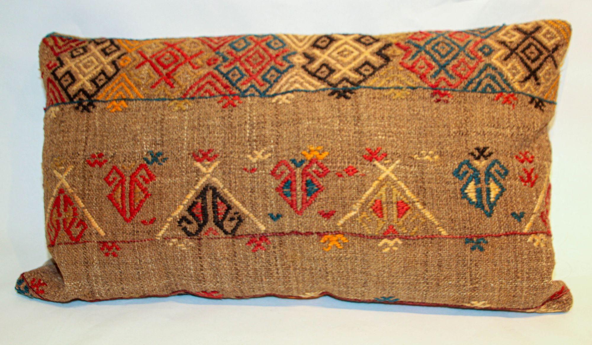 Moroccan large decorative lumbar pillow, handmade kilim flat weave pillow, bohemian style throw pillow, organic wool pillow.
One-of-a-kind vintage kilim pillow Moroccan Berber handwoven tribal lumbar pillow made from a vintage rug.
Geometric